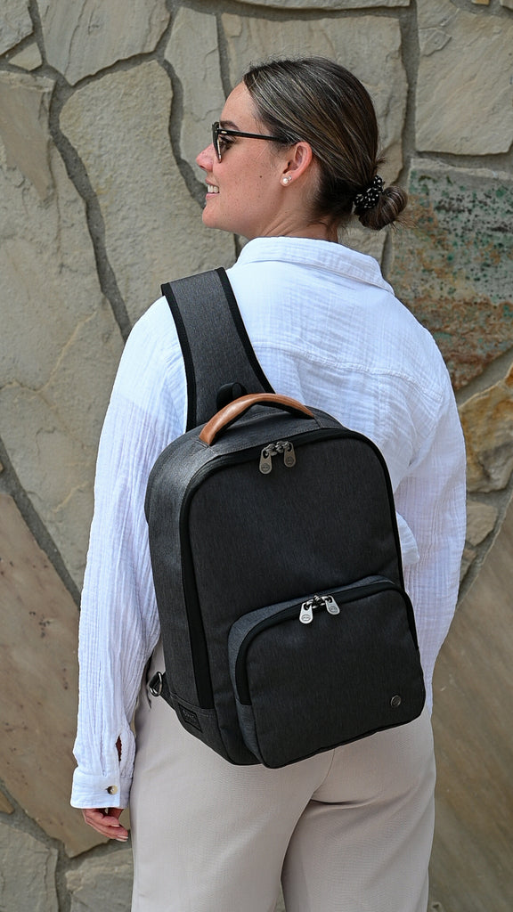 Woman wearing PKG Robson 12L Cross-Body Laptop Bag