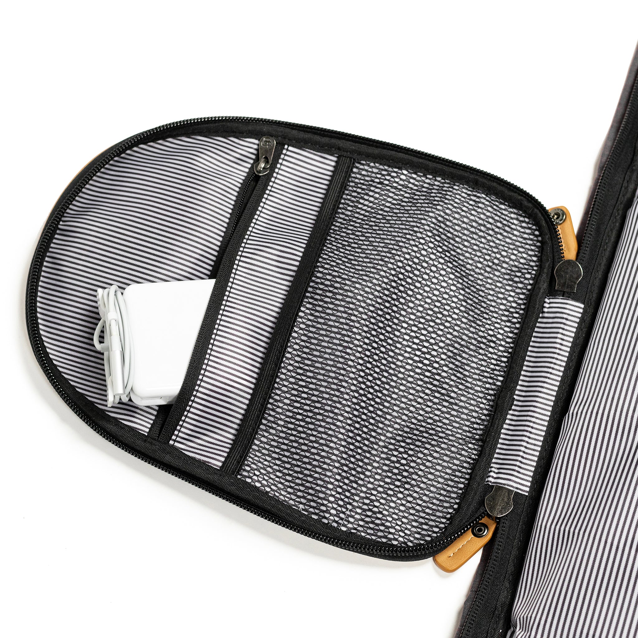 PKG Bishop 42L Recycled Duffle Bag showing inside opened duffel, revealing storage compartments