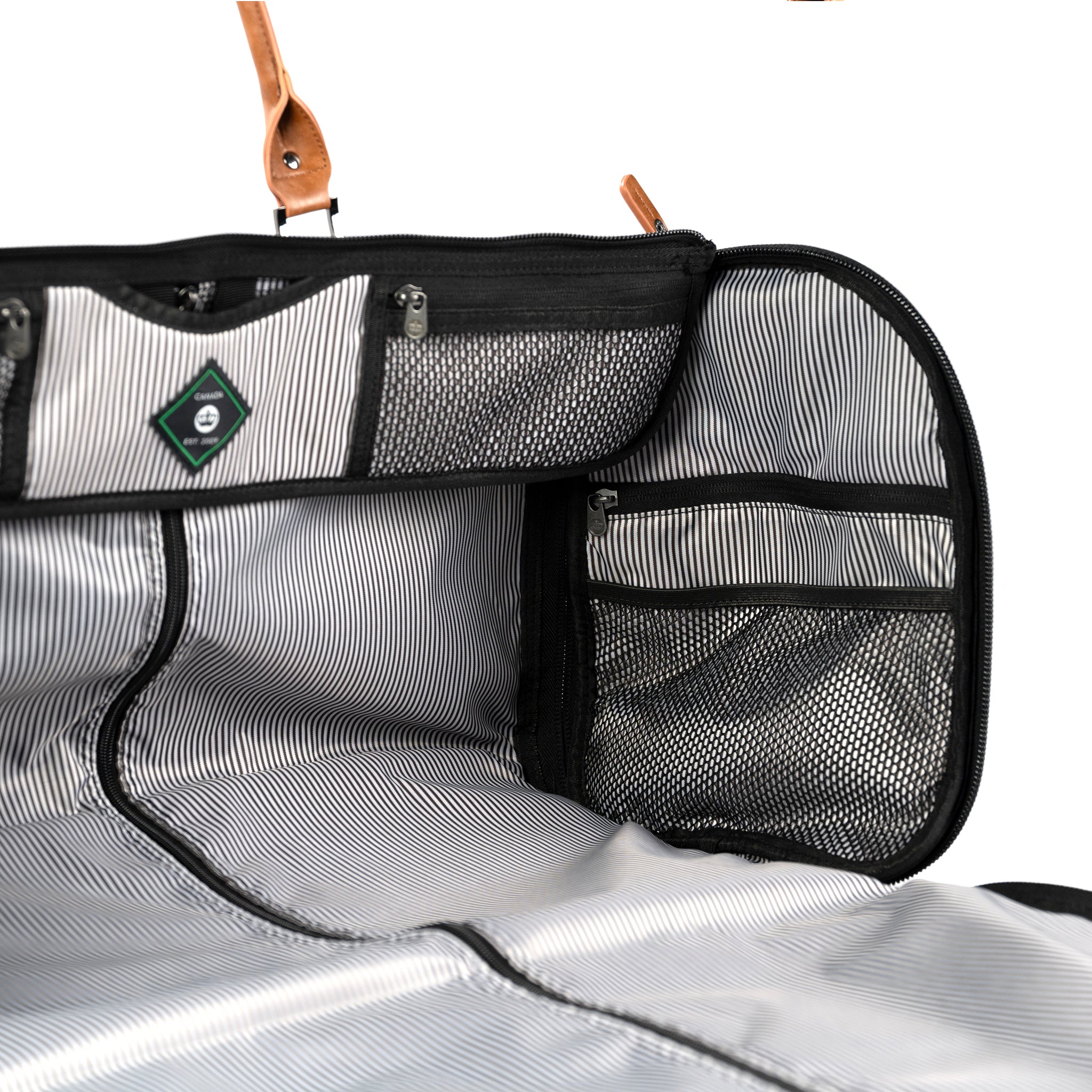PKG Bishop 42L Recycled Duffle Bag showing inside opened duffel, revealing storage compartments