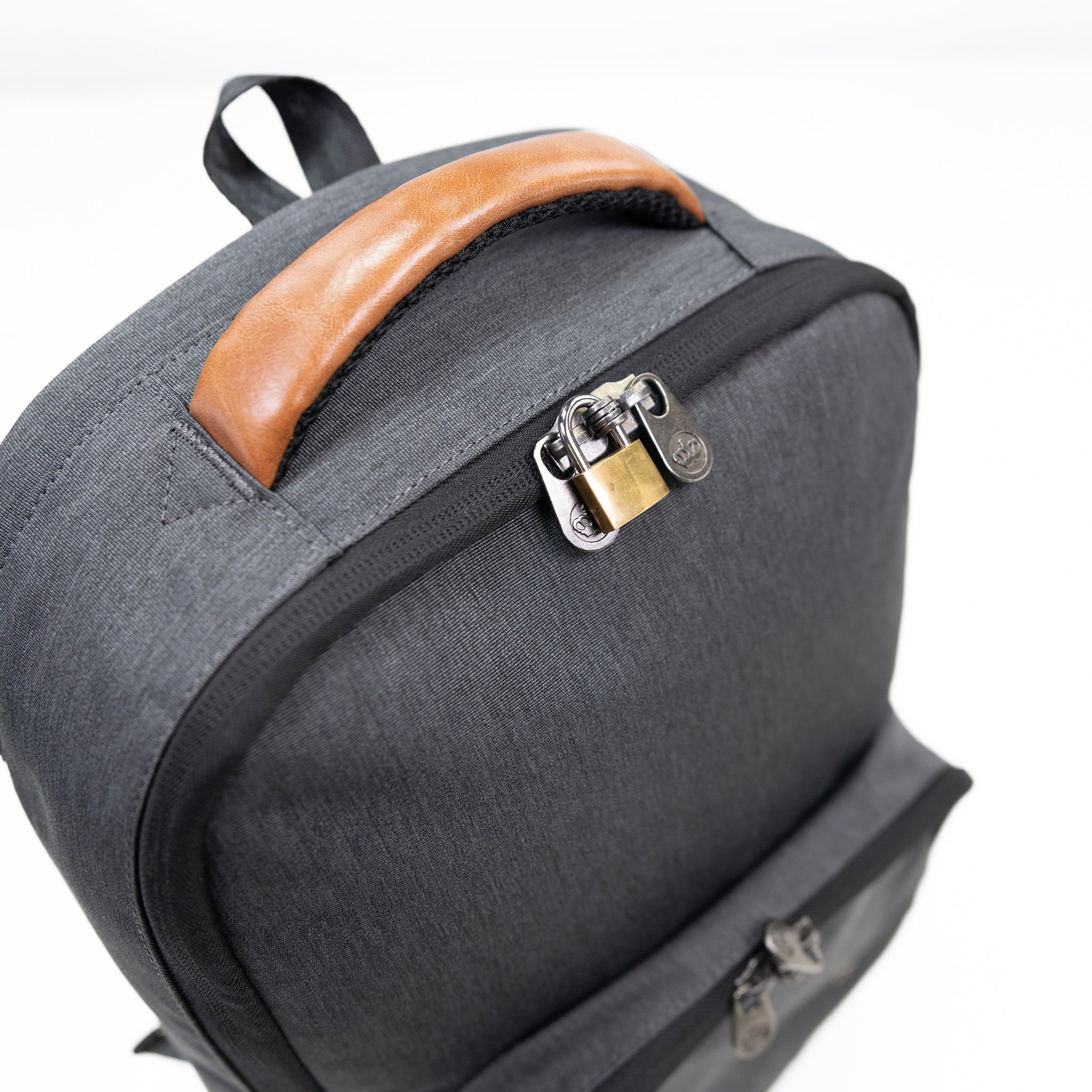 PKG Robson 12L Cross-Body Laptop Bag top view showing lockable zippers with padlock connected