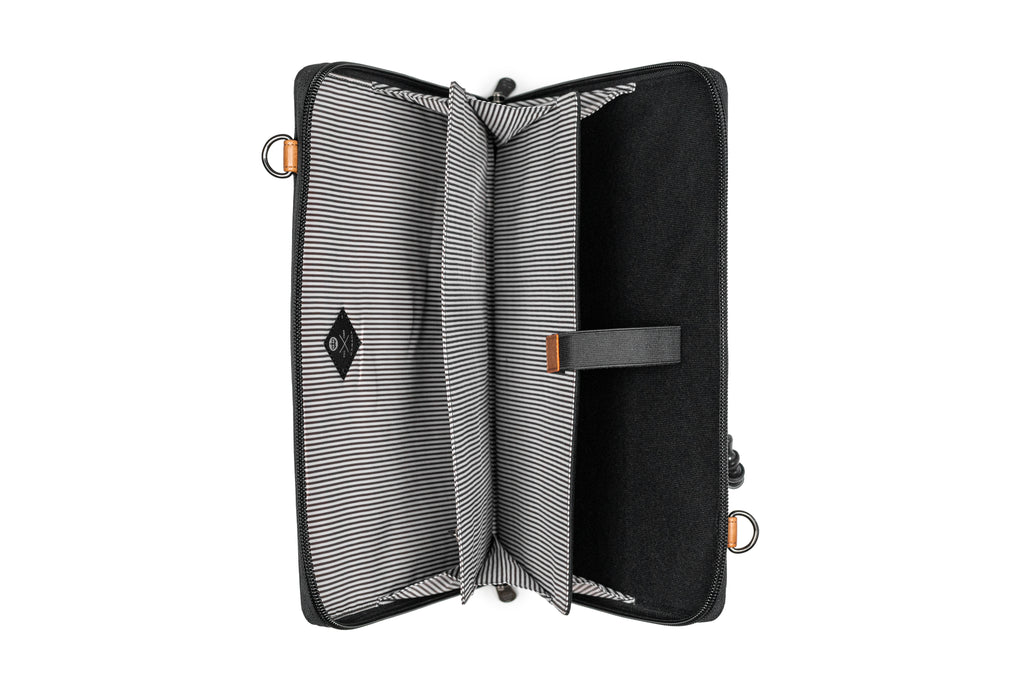 PKG Wellington 10L Messenger (black) top open view showing accordion style file slots with built in organization for office equipment and laptop
