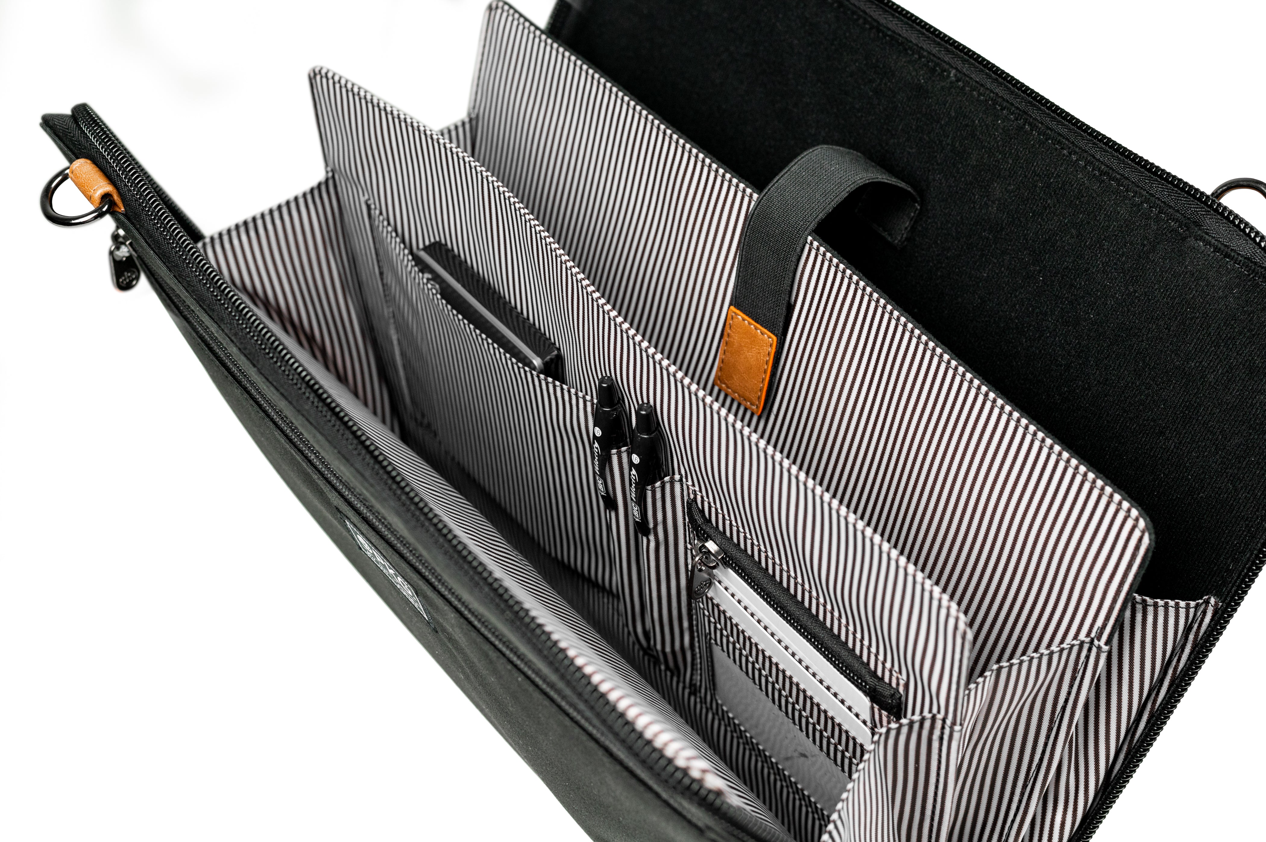 PKG Wellington 10L Messenger (dark grey) top open view showing accordion style file slots with built in organization for office equipment and laptop