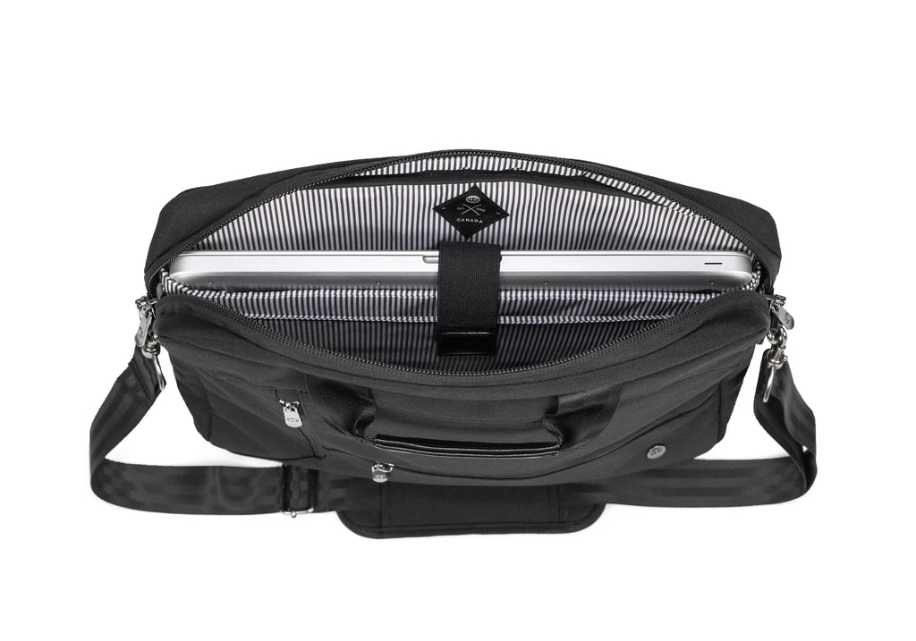 PKG Annex recycled messenger shoulder bag (blackout), open top view of main compartment showing functional laptop sleeve