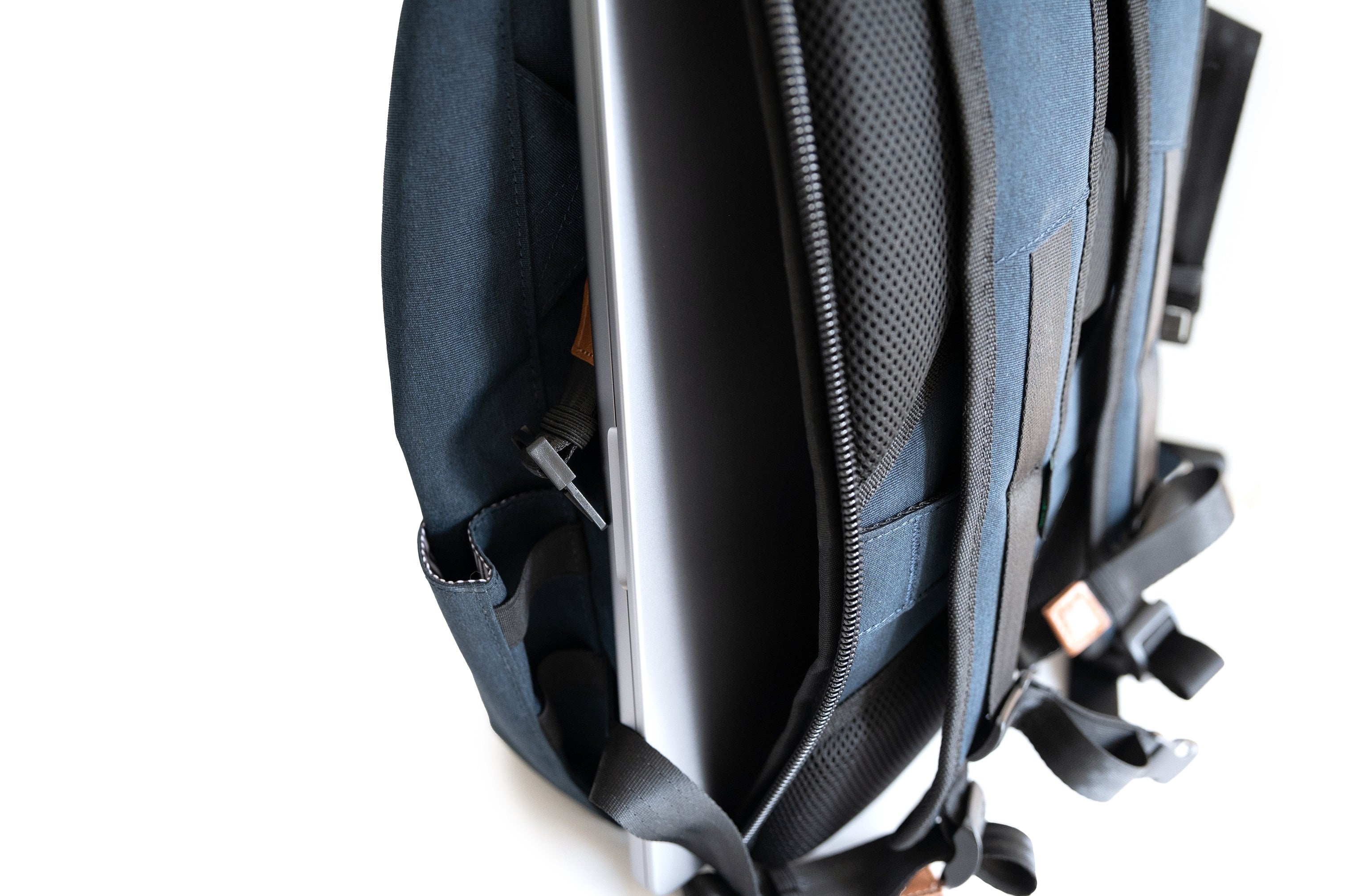 Dawson 28L Roll-Top recycled backpack (navy) showing dedicated laptop pocket