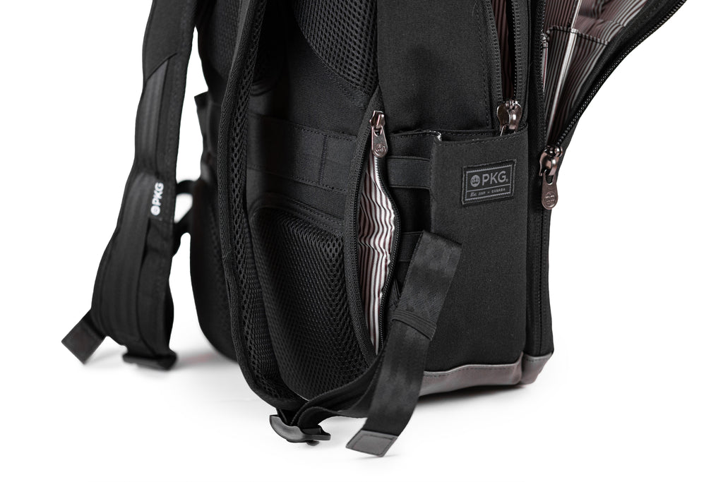 PKG Durham Commuter 17L recycled backpack (black) showing hidden side pocket