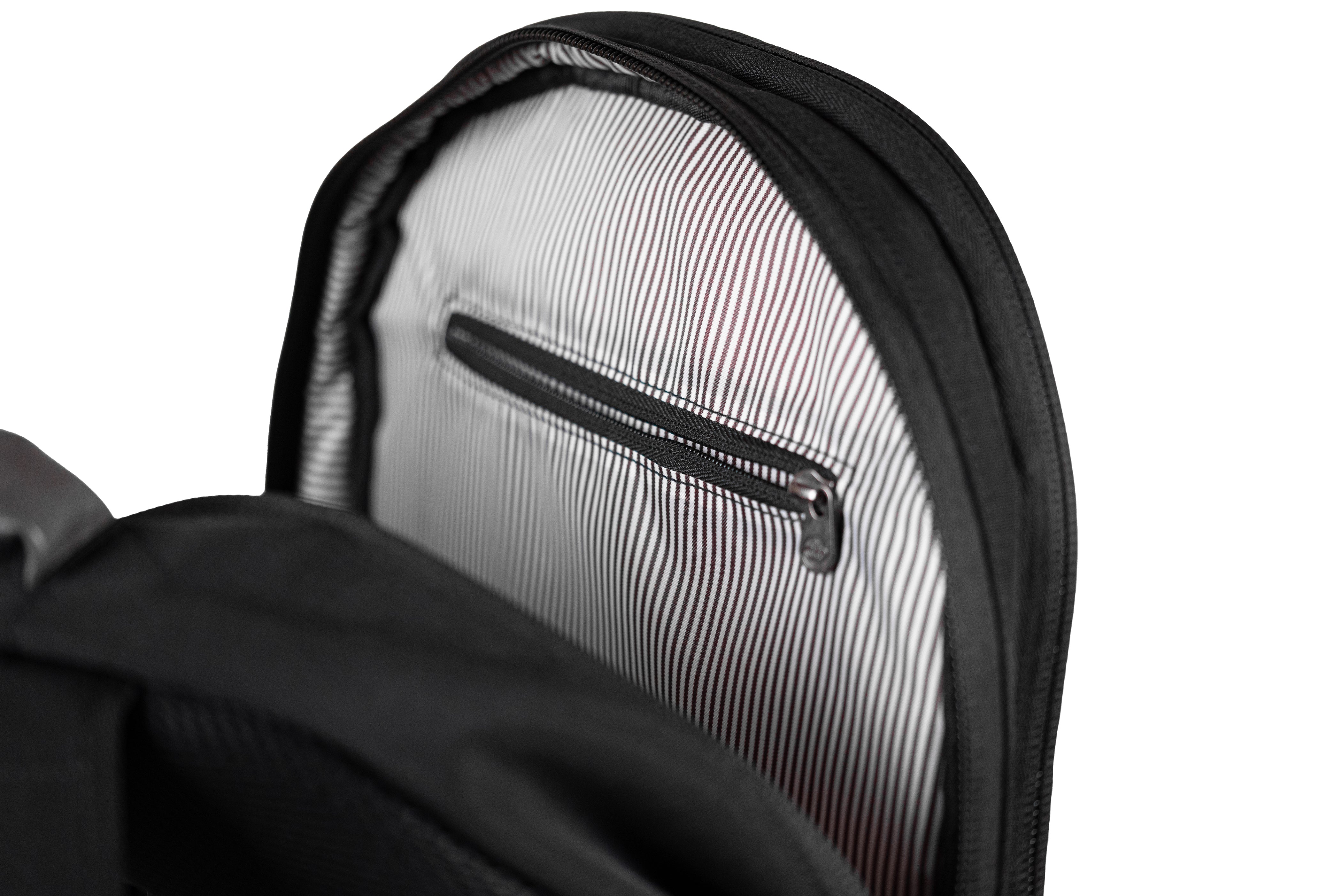 PKG Durham Commuter 17L recycled backpack (black) showing sunglasses compartment