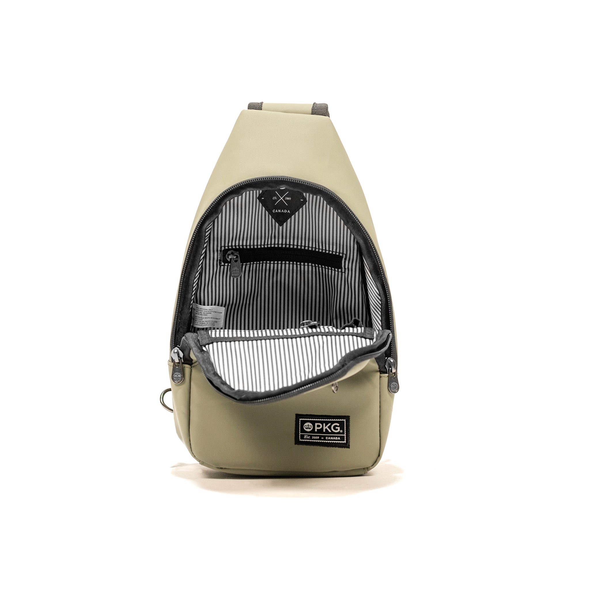 Elora Recycled Cross Body Bag (tranquil green) showing inner organization and pockets