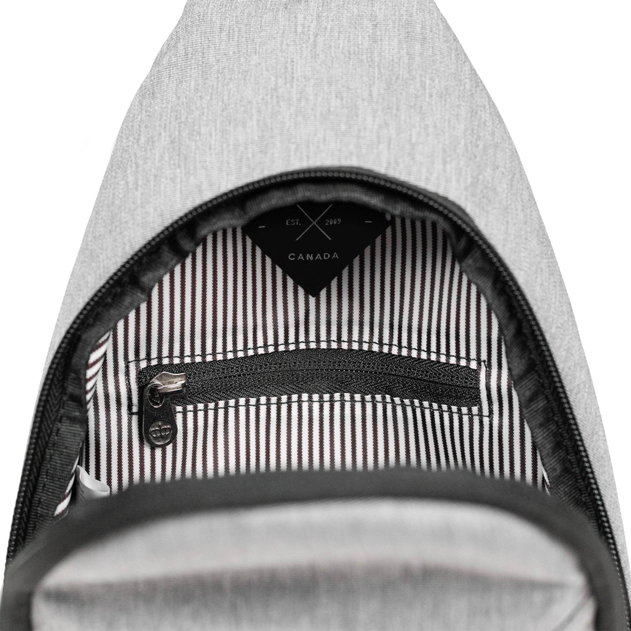 Elora Recycled Cross Body Bag (light grey) showing inner pocket for valuables