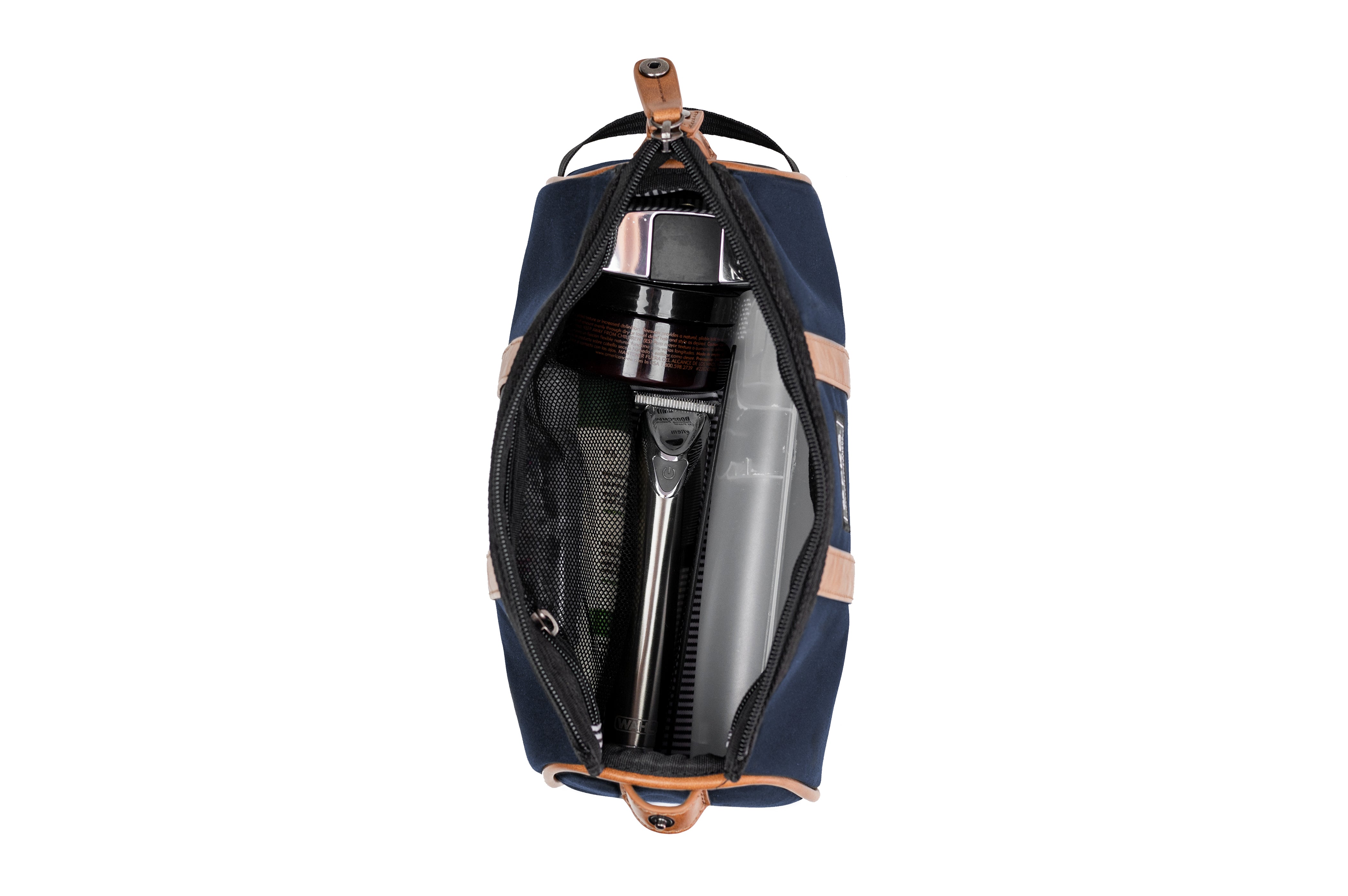 PKG Charlotte Recycled Toiletry Bag (navy) top view showing toiletry products inside organized compartments