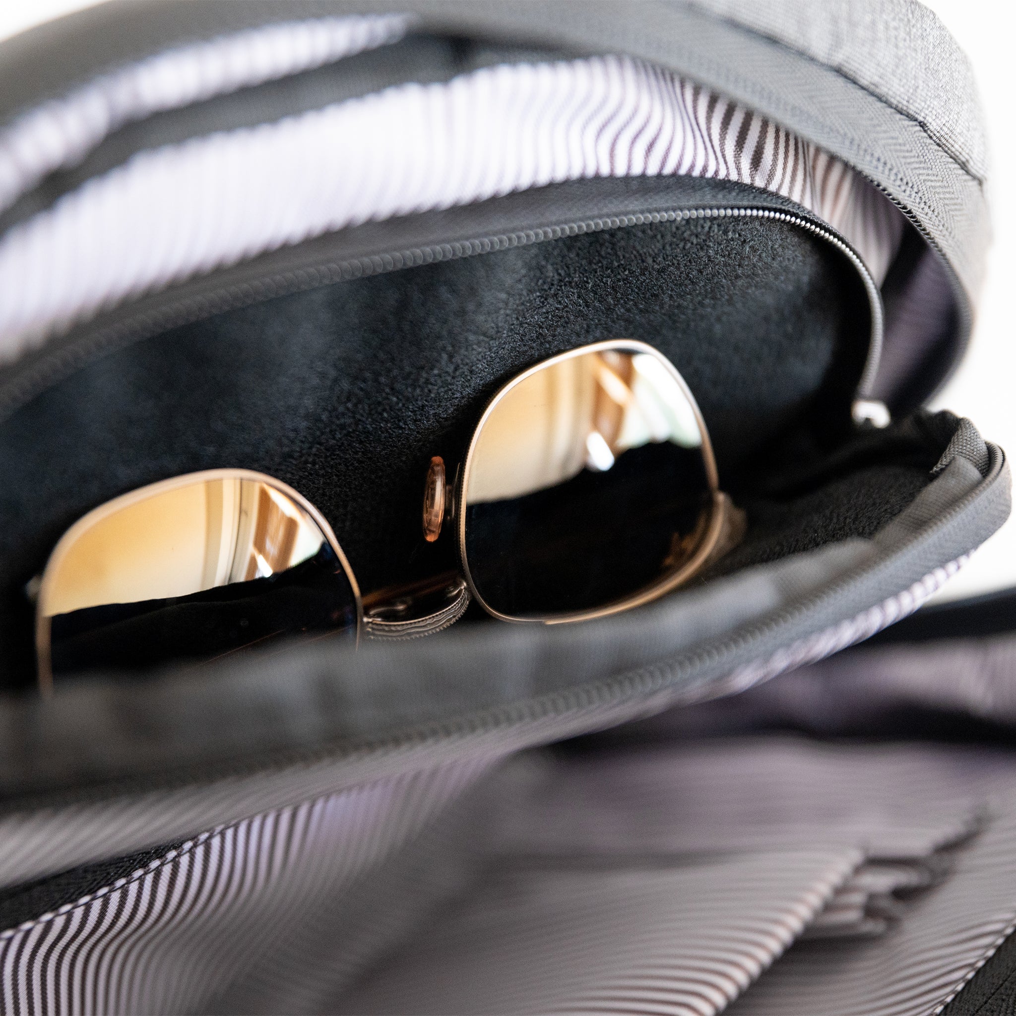 Durham Outpost recycled commuter backpack (dark grey) sunglass pocket