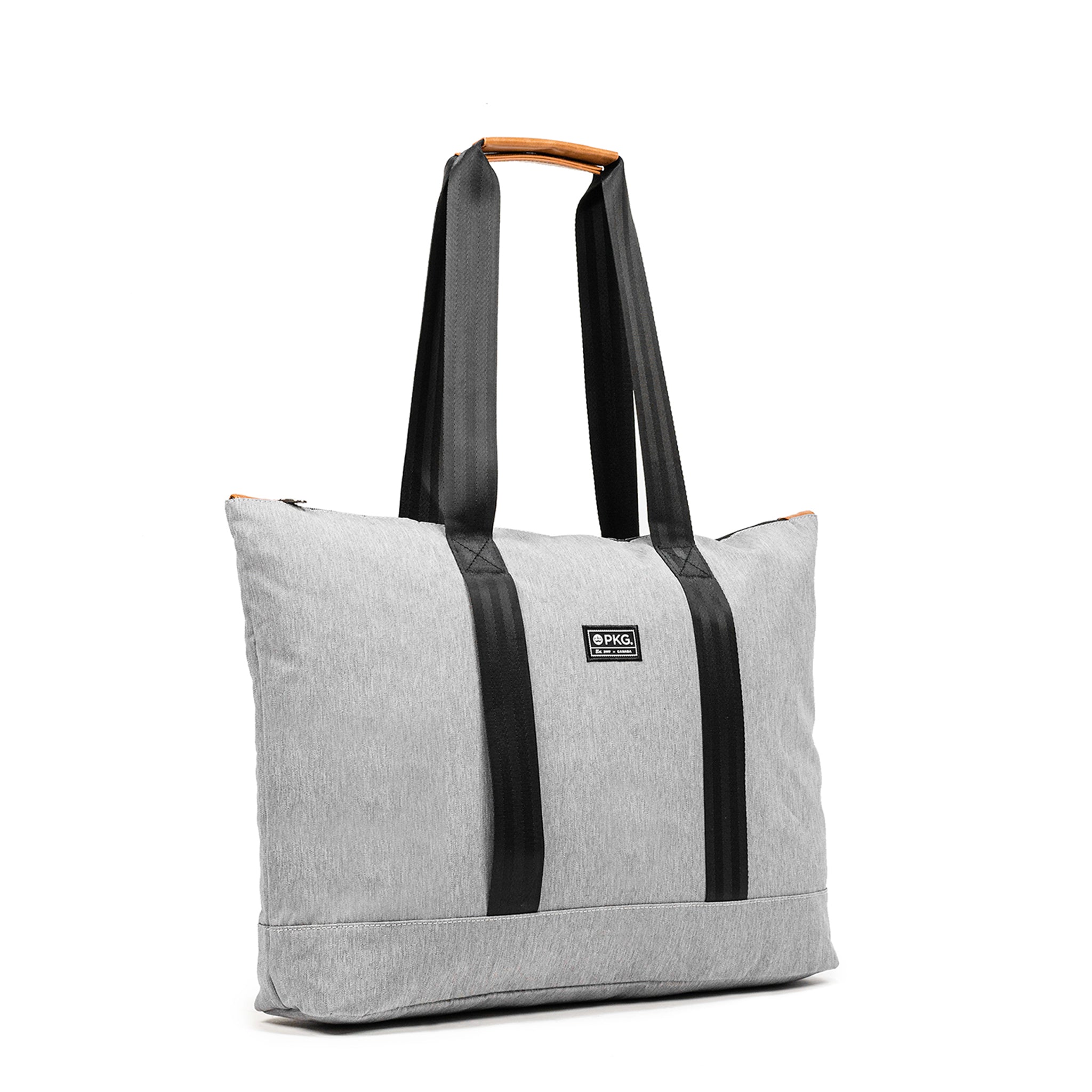 PKG Lawrence 16L Recycled Tote Bag (light grey). This mid-size tote, made from weather-resistant recycled fabrics, is your ideal everyday carry. With exterior trolley straps, it's perfect for women's purse essentials or a laptop bag