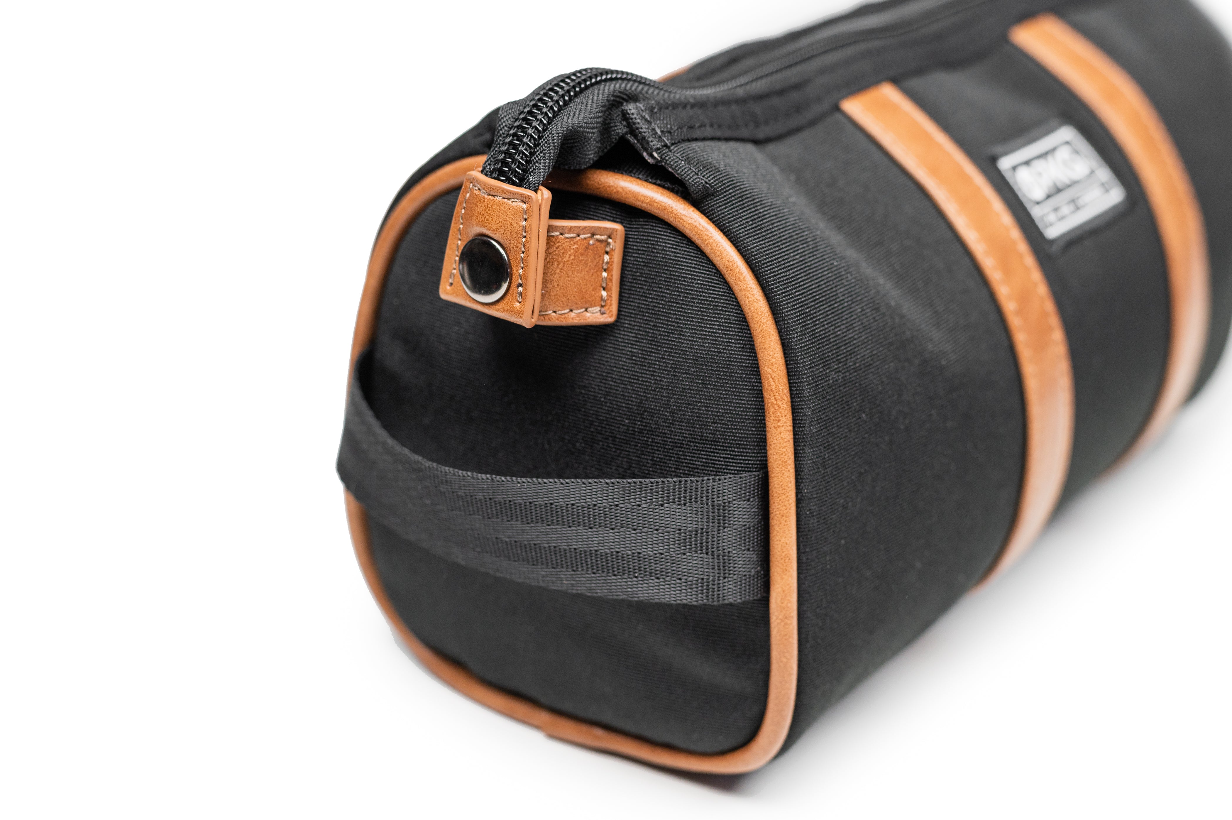 PKG Charlotte Recycled Toiletry Bag (black) side view showing strap