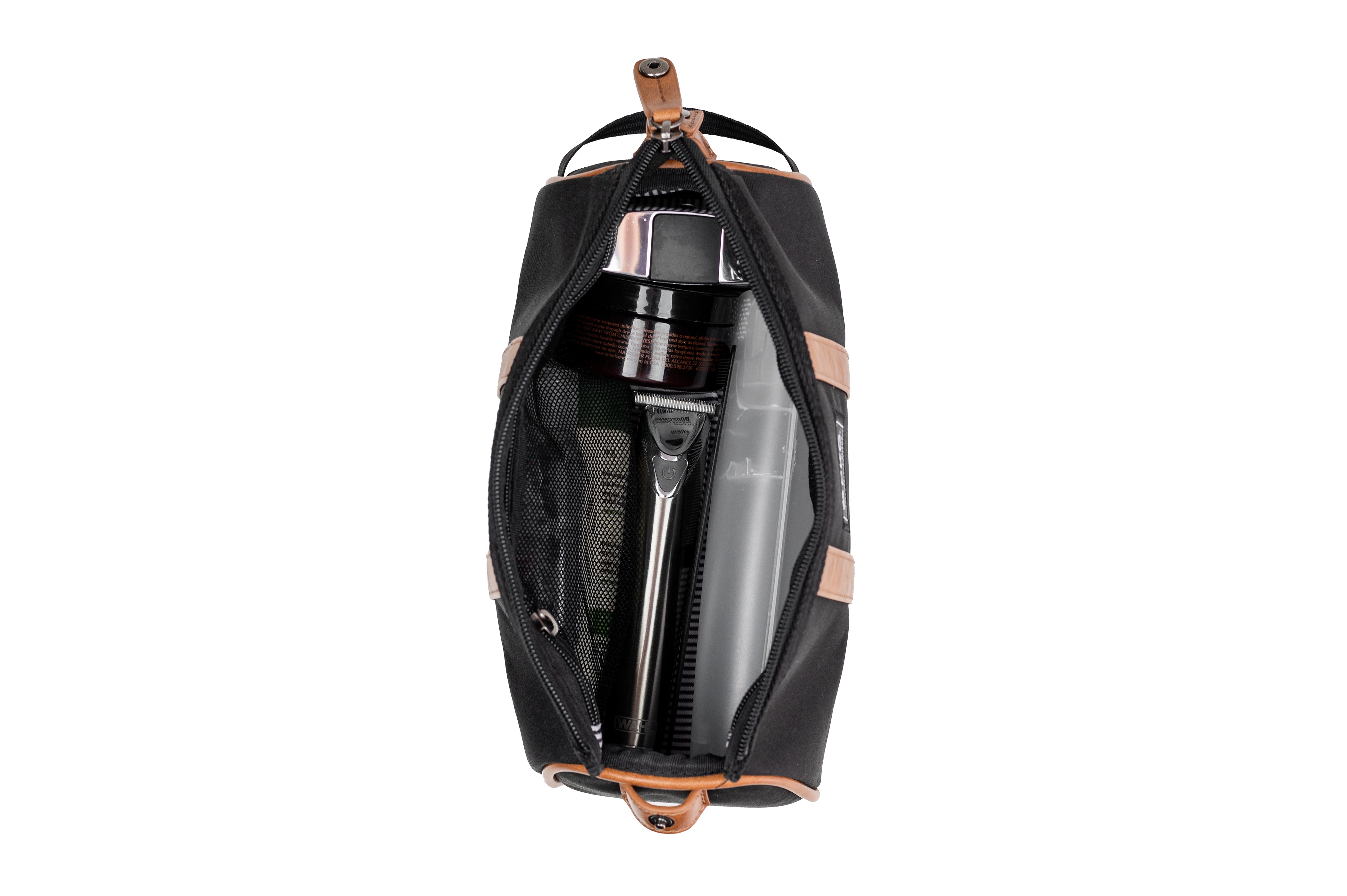 PKG Charlotte Recycled Toiletry Bag (black) top view showing toiletry products inside organized compartments