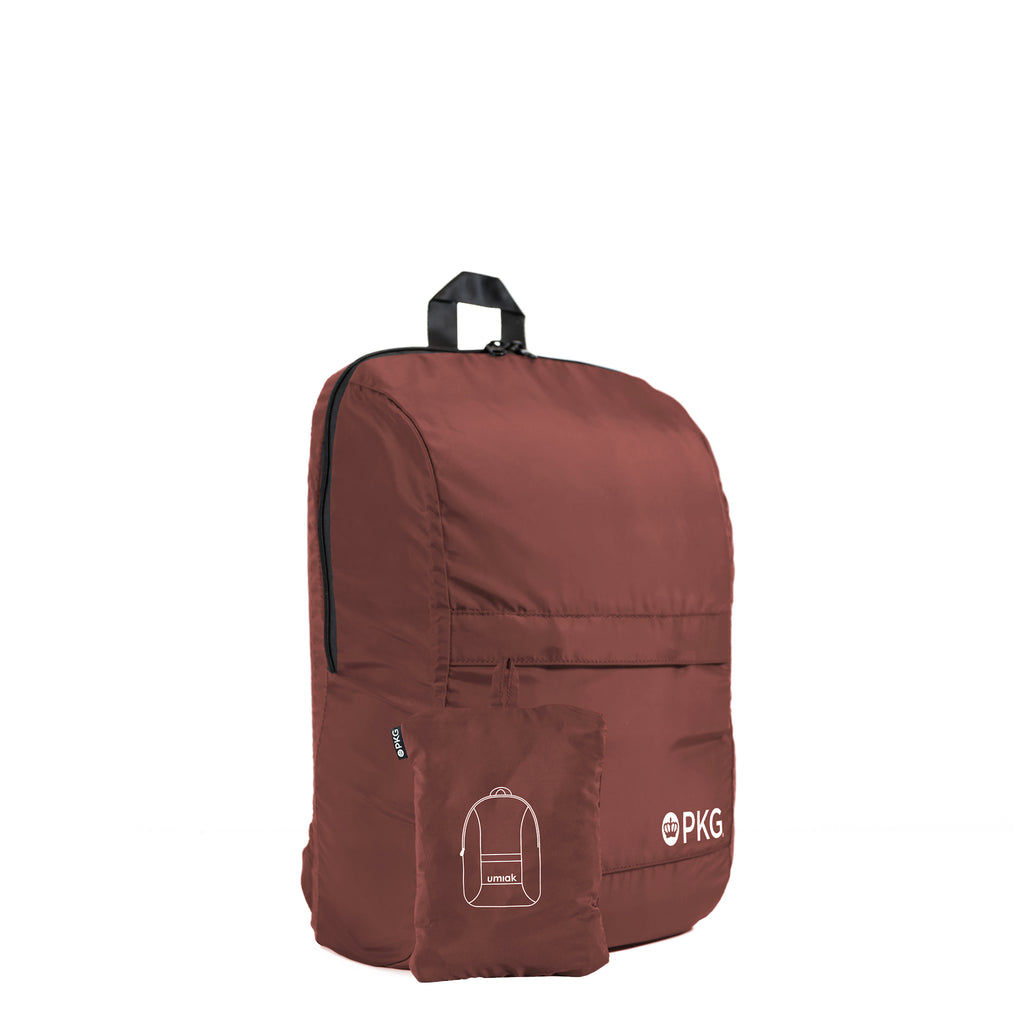Umiak 28L Recycled Backpack (rum raisin) your eco-friendly everyday travel companion. Built with 100% recycled, water-resistant, and tear-resistant material. Antimicrobial, odor-resistant, and exceptionally durable with reinforced seams