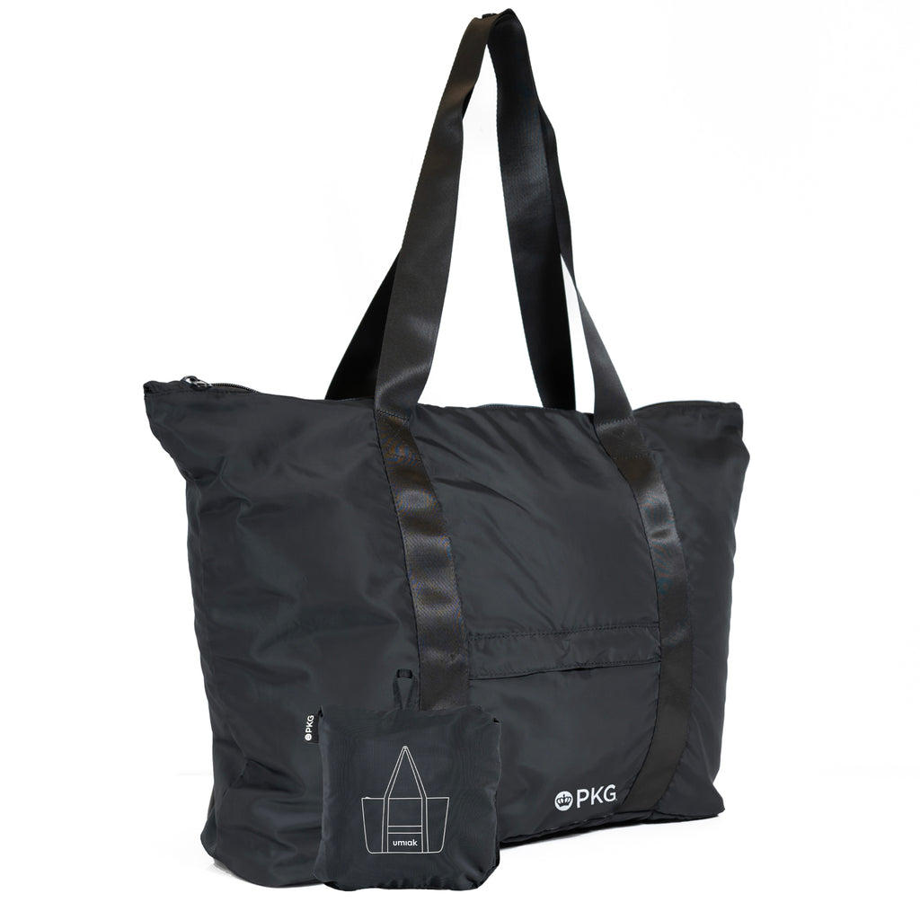 PKG Umiak 33L Recycled Packable Tote (black) – your eco-friendly EVERYDAY carry. This versatile tote, made with 100% recycled material, is antimicrobial, water-resistant, and tear-resistant. Reinforced seams add durability. Ideal for work, travel, and daily use.