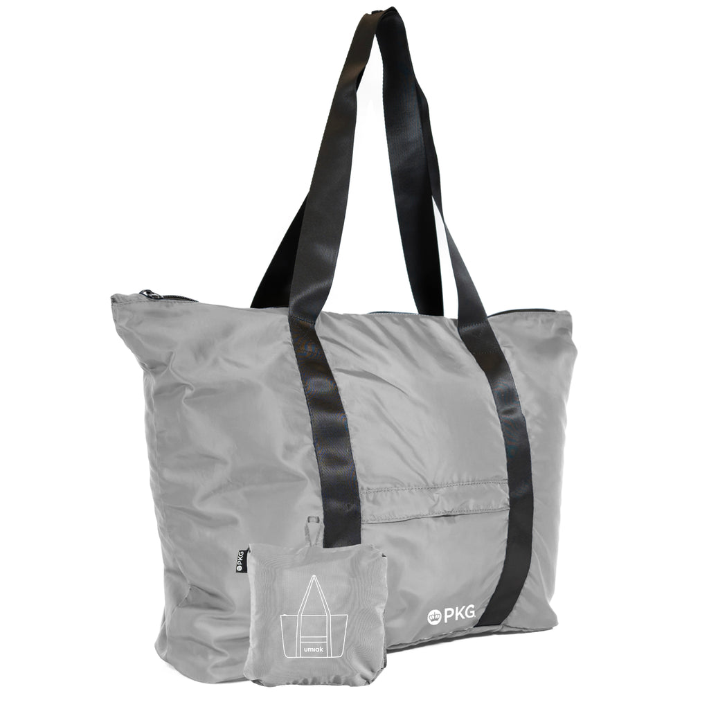 PKG Umiak 33L Recycled Packable Tote (light grey) – your eco-friendly EVERYDAY carry. This versatile tote, made with 100% recycled material, is antimicrobial, water-resistant, and tear-resistant. Reinforced seams add durability. Ideal for work, travel, and daily use.