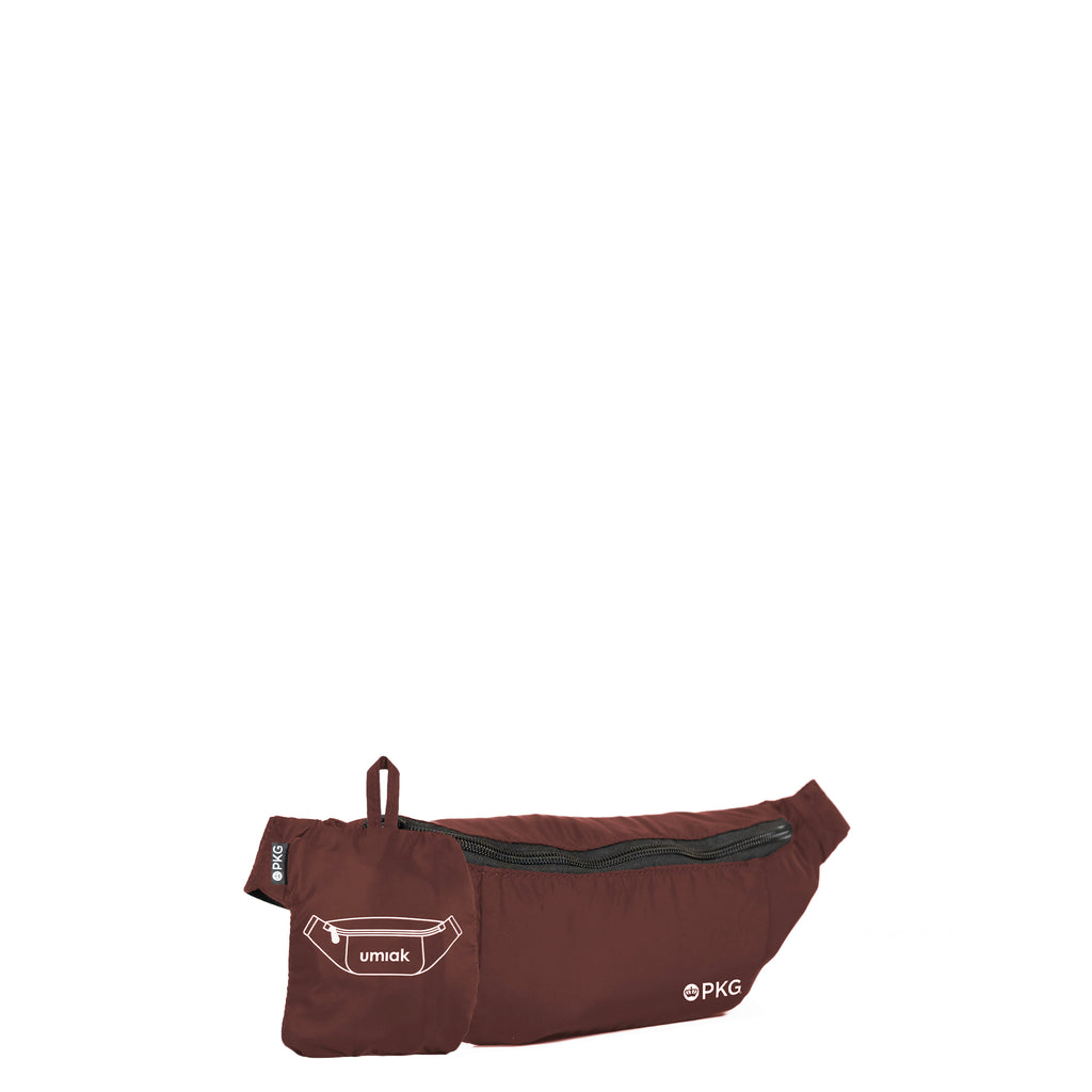 Umiak 3L Recycled Cross-Body (rum raisin) – your eco-friendly everyday travel companion. Built with 100% recycled, water-resistant, and tear-resistant material. Antimicrobial, odor-resistant, and exceptionally durable with reinforced seams.
