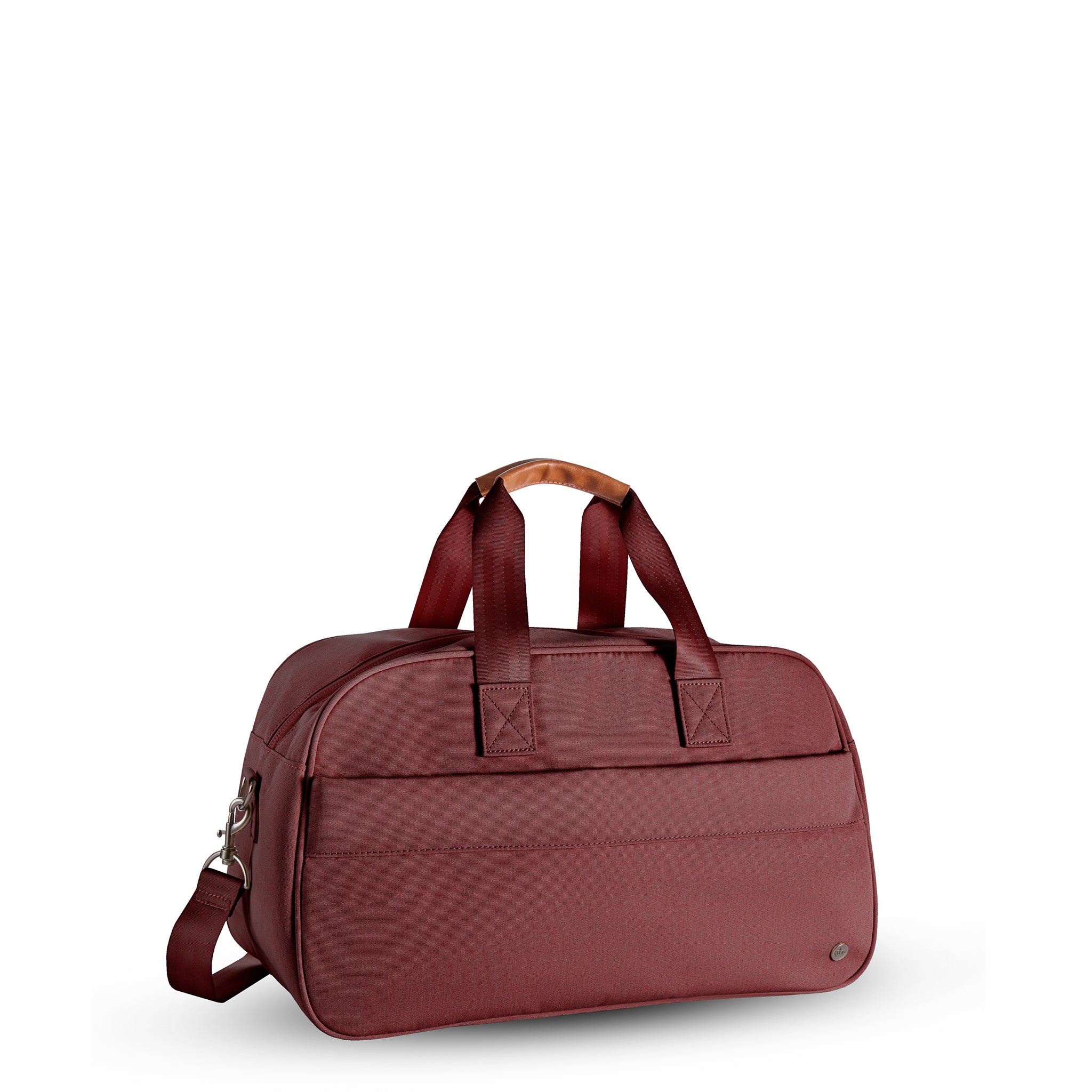 PKG Westmount 26L Recycled Duffle Bag (rum raisin) – a midsize daily carry crafted from weather-resistant, recycled 600D polyester. With lockable zippers, padded strap, and vegan leather accents, it's your ideal duffle for eco-friendly adventures