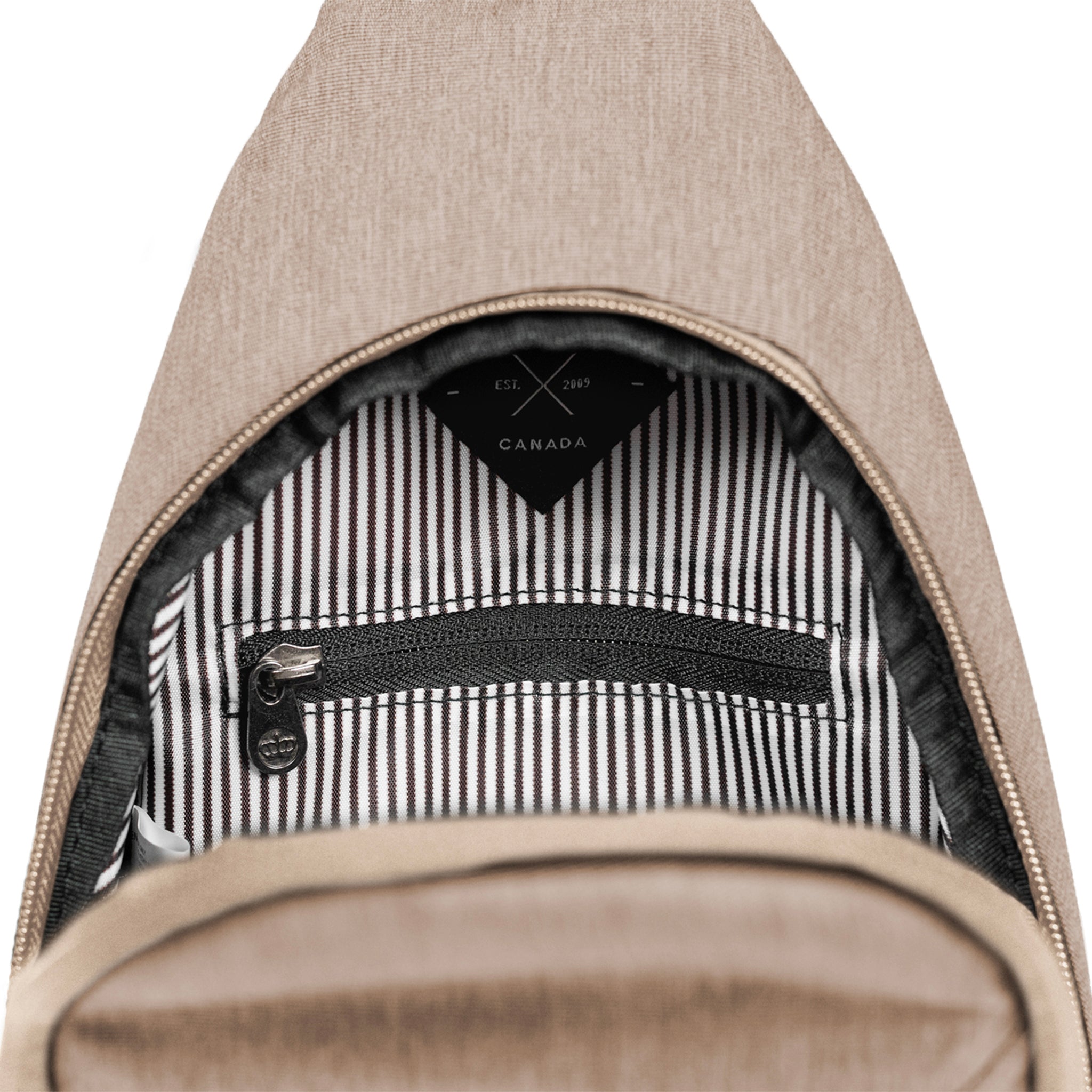 Elora Recycled Cross Body Bag (ginger root) showing inner pocket for valuables