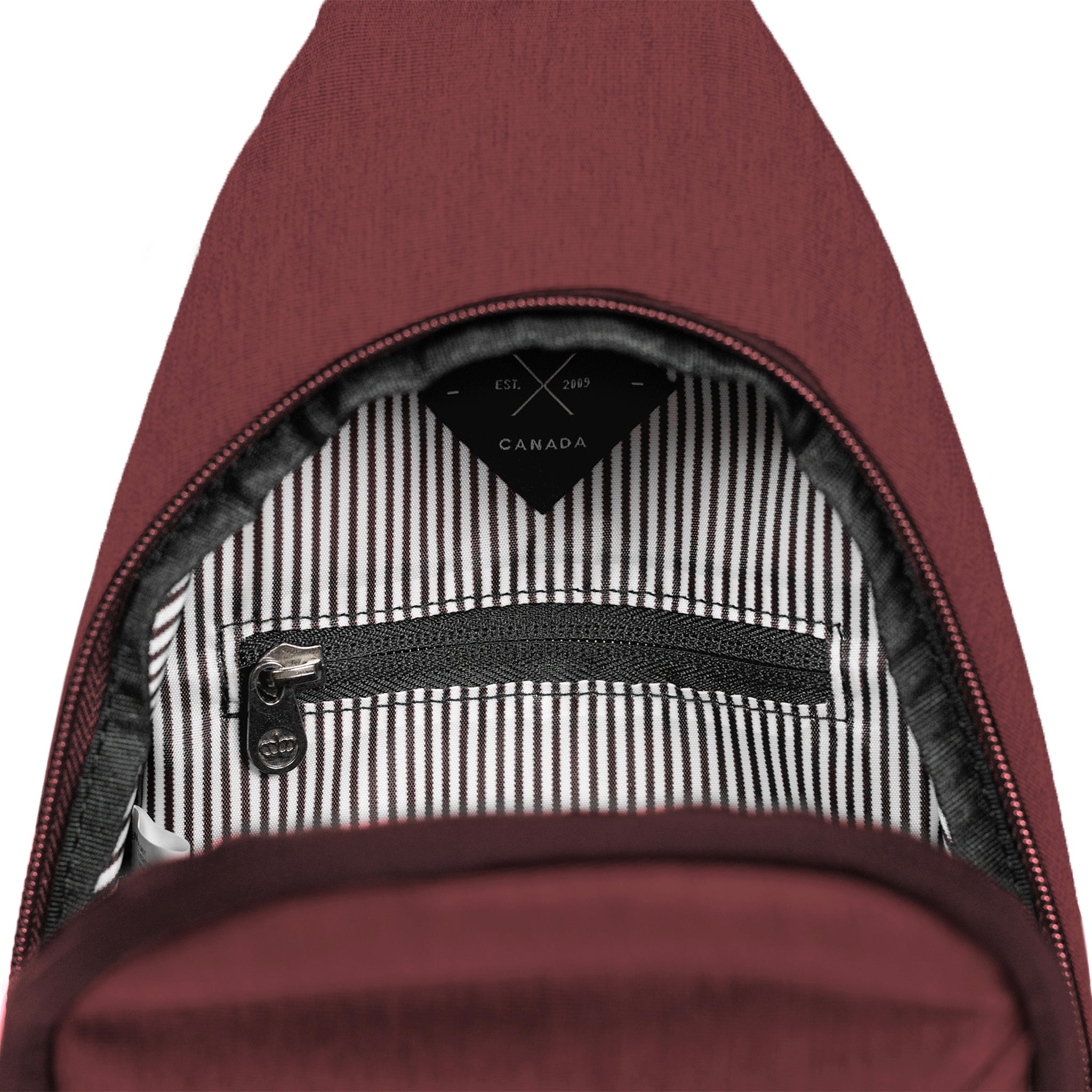 Elora Recycled Cross Body Bag (rum raisin) showing inner pocket for valuables