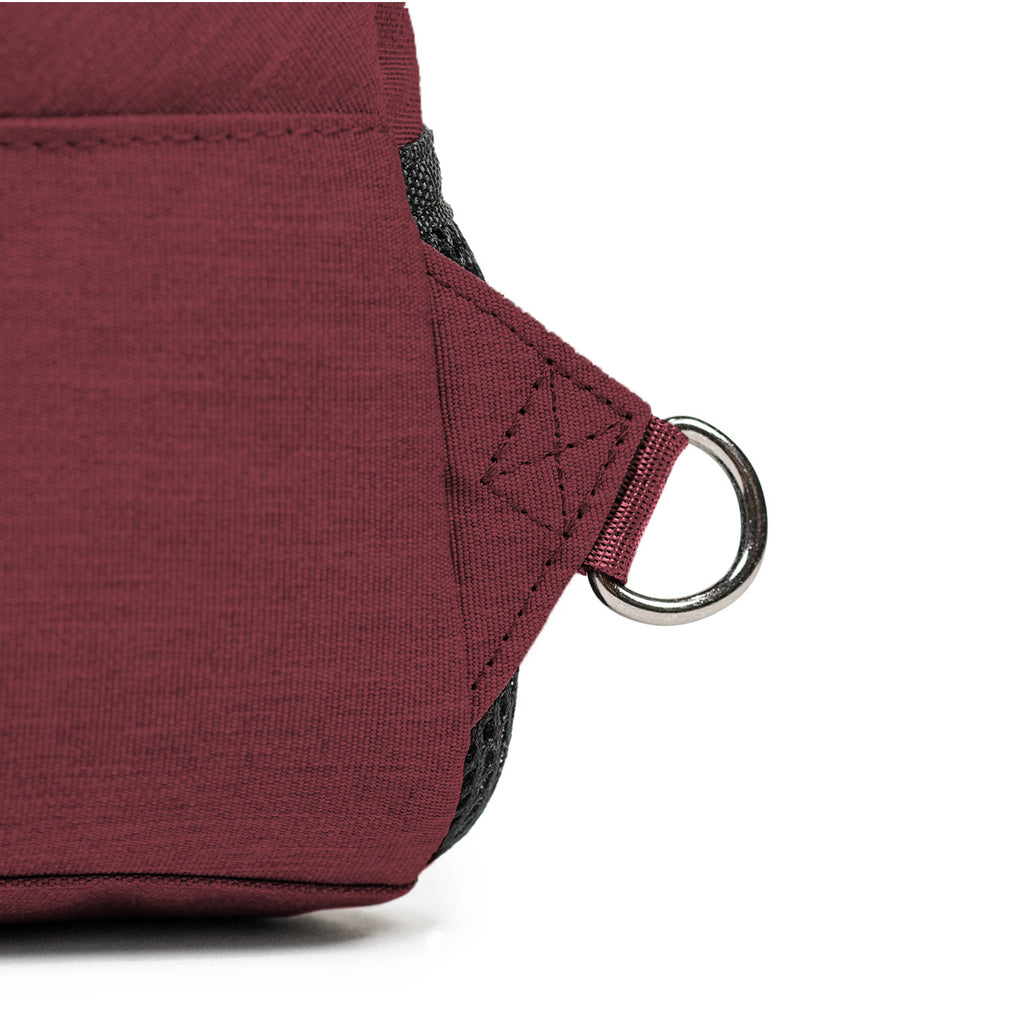 Elora Recycled Cross Body Bag (rum raisin) showing d-ring for attaching adjustable strap