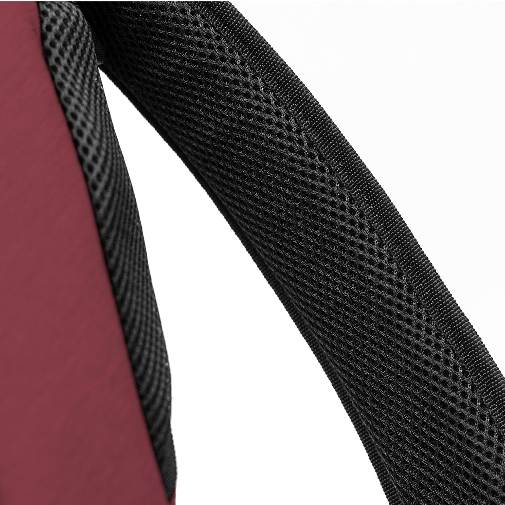 Elora Recycled Cross Body Bag (rum raisin) detailed view of padded cross body strap for comfort