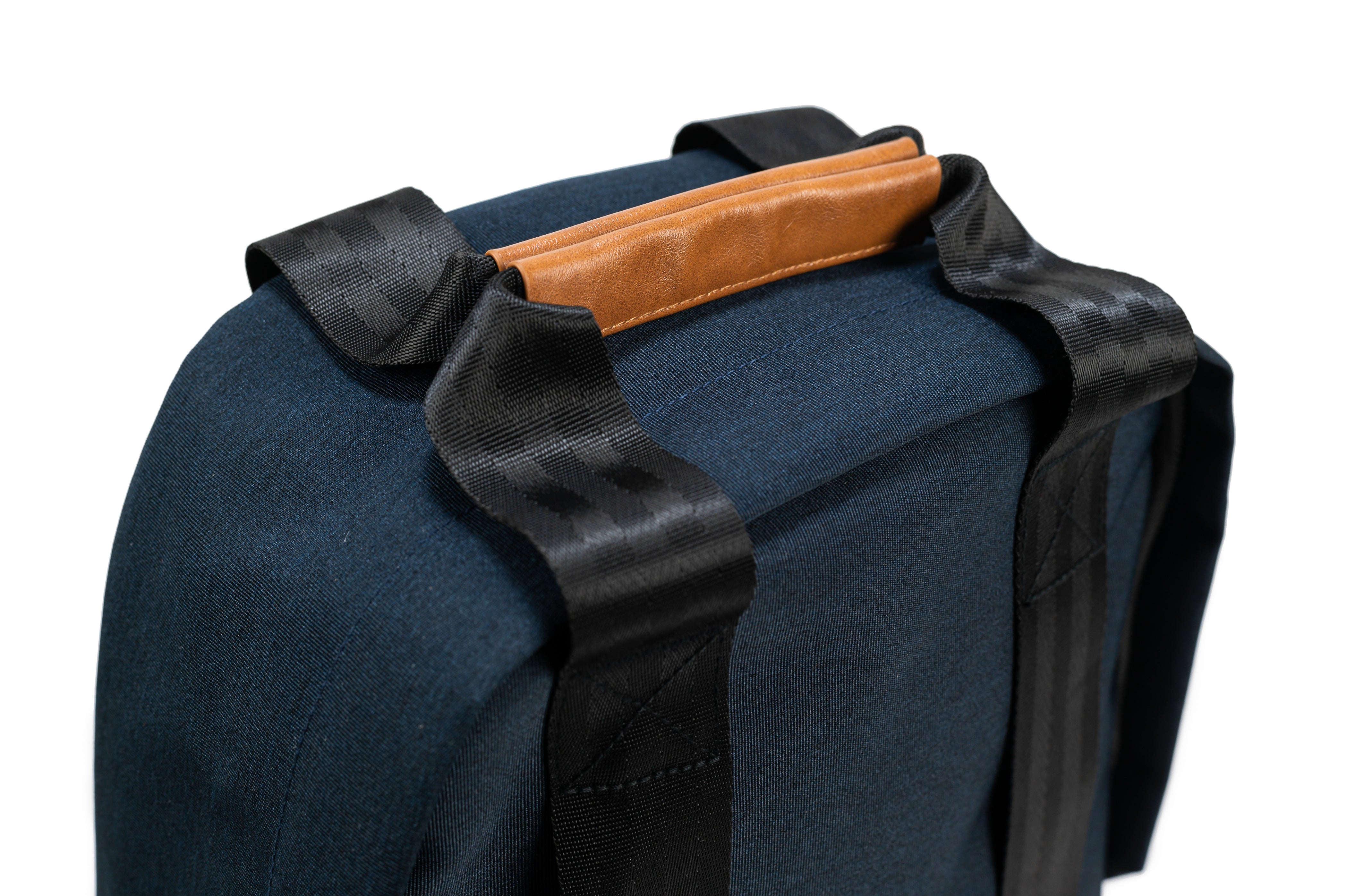 PKG Rosseau 19L Recycled Backpack Tote (navy) detailed top view of vegan leather magnetic tote handles for aesthetic and functionality
