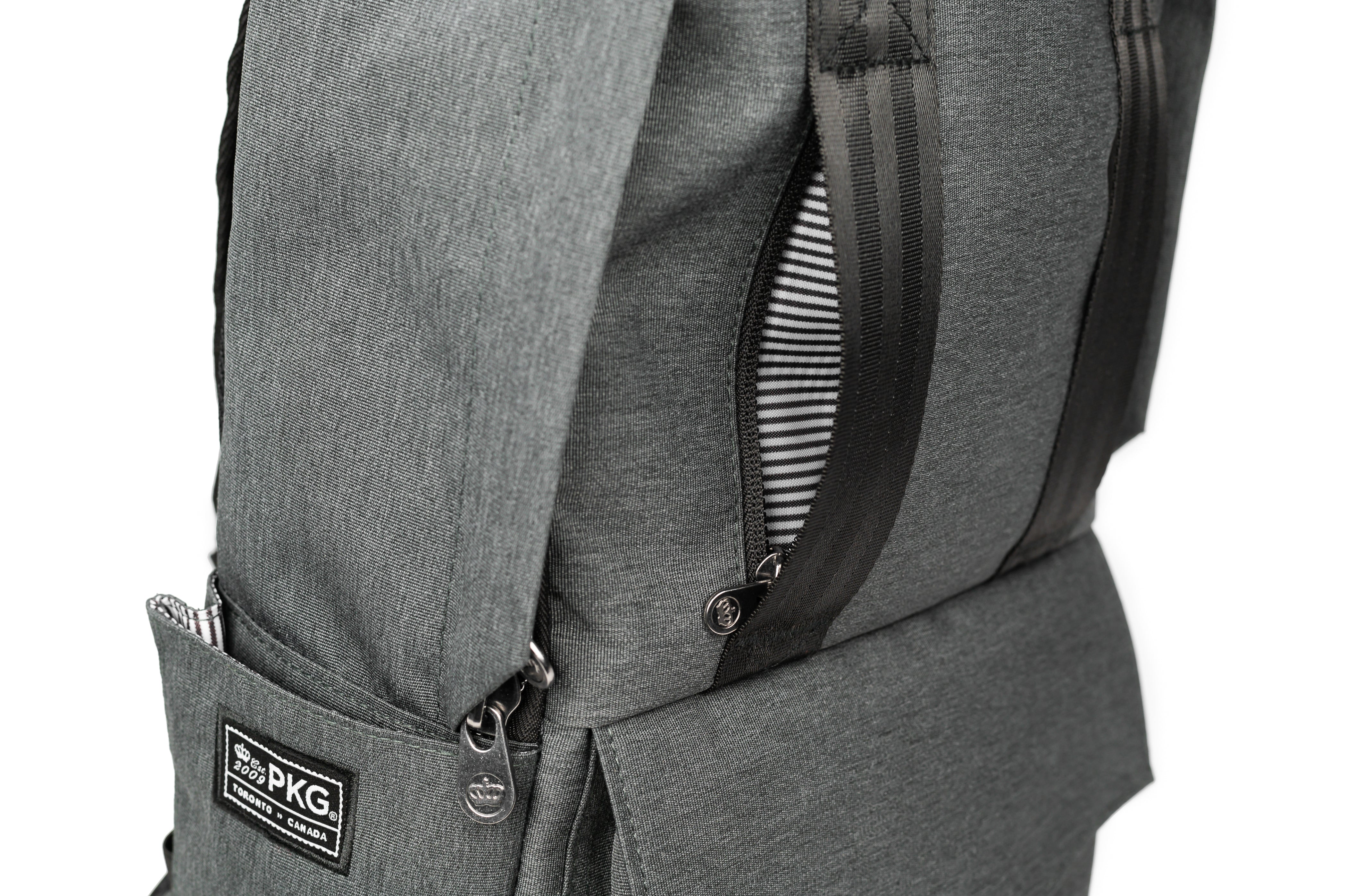 PKG Rosseau 19L Recycled Backpack Tote (grey) showing detailed view of hidden front pocket behind tote handles