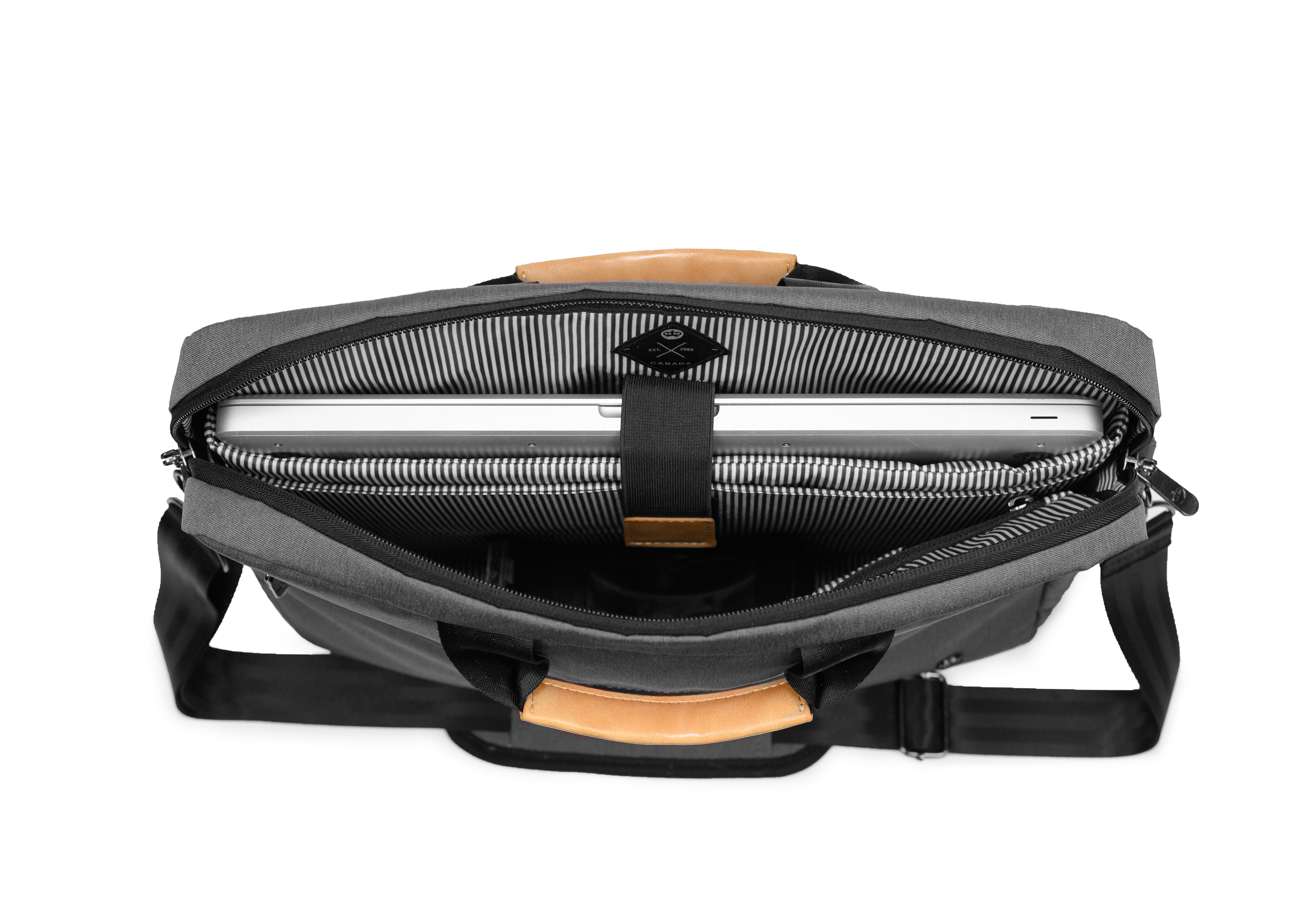 PKG Spadina 10L Messenger Bag (dark grey) open top view showing dedicated laptop pocket and internal organization for tech and office equipment