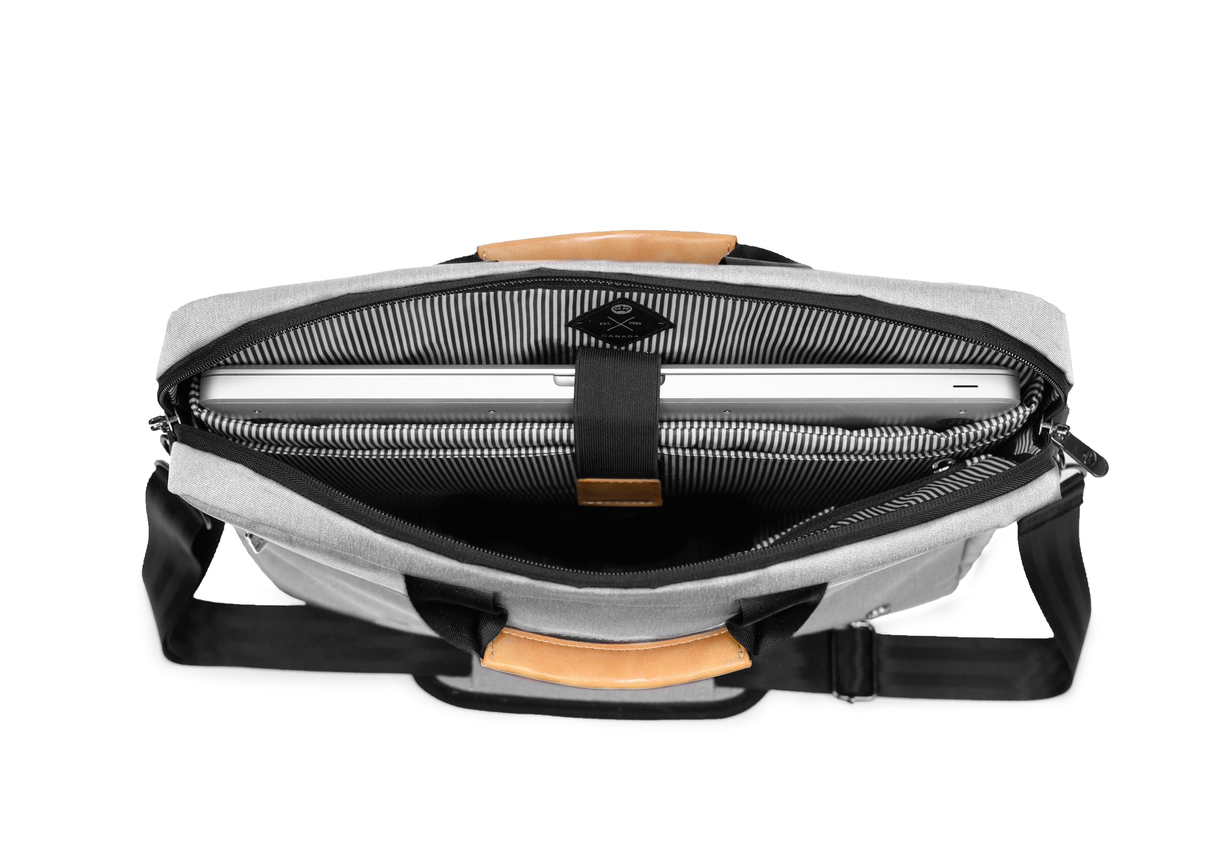 PKG Spadina 10L Messenger Bag (light grey) open top view showing dedicated laptop pocket and internal organization for tech and office equipment