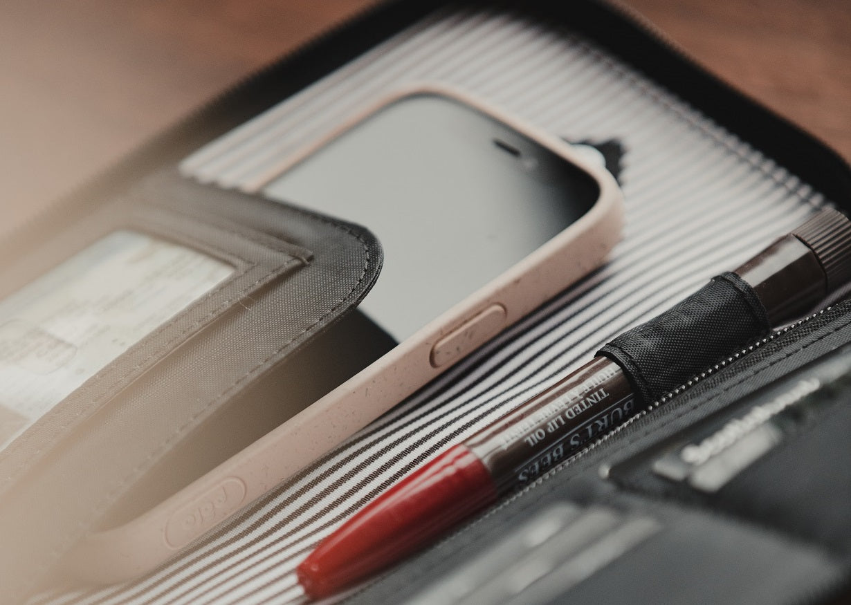 Victoria RFID Clutch Wallet open, showing phone and pen stored inside dedicated compartments