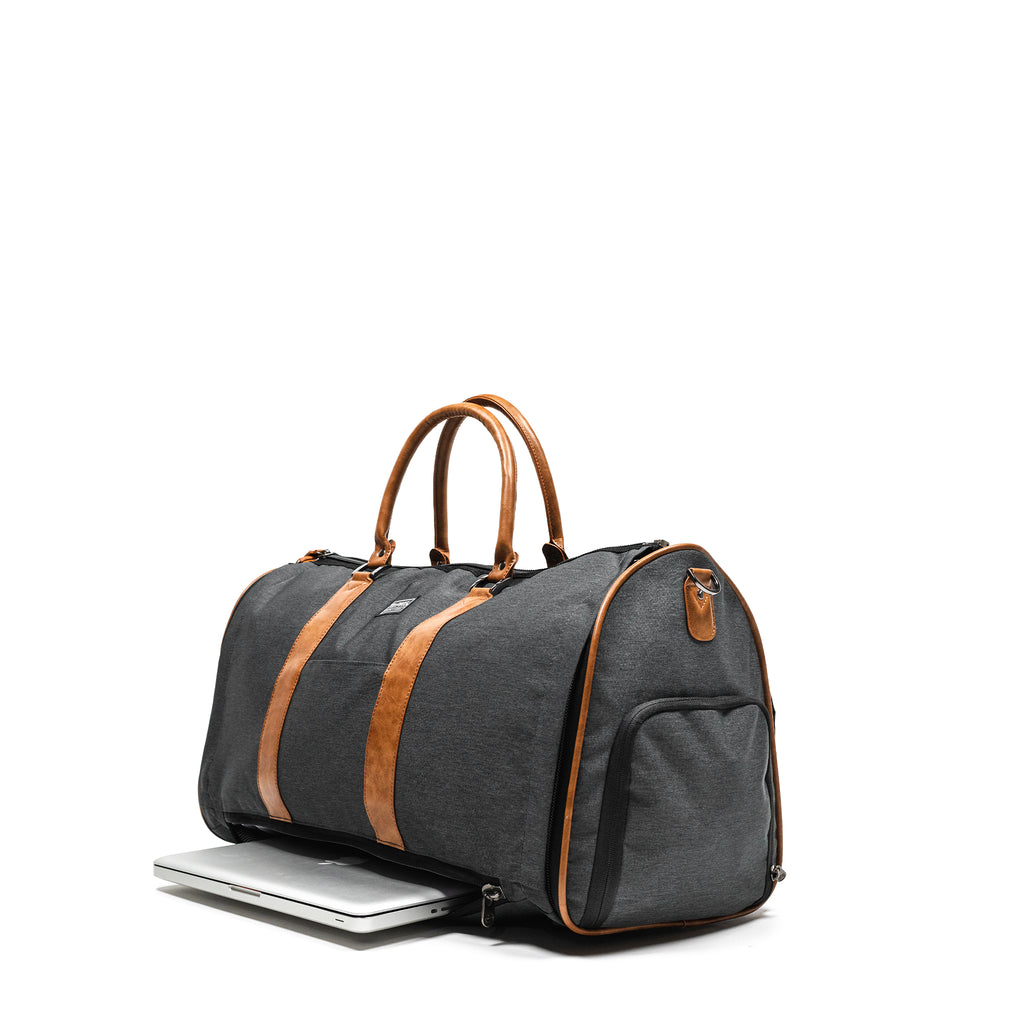 PKG Bishop 42L Recycled Duffle Bag (grey) showing laptop in dedicated laptop compartment