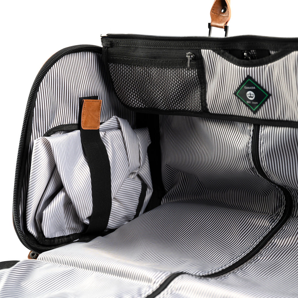 PKG Bishop 42L Recycled Duffle Bag showing inside opened duffel, revealing storage compartments