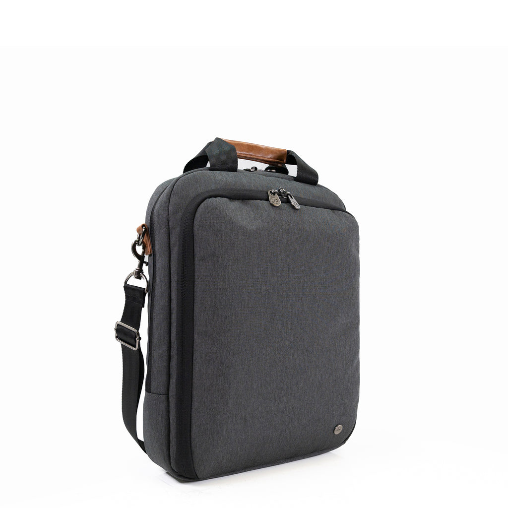 PKG Riverdale 11L Messenger Bag: Urban style, recycled materials, vegan leather, hidden magnets. Stay organized with filing, laptop compartment, lockable zippers. Adjustable strap, trolley strap, glasses compartment