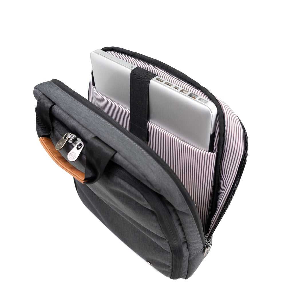 PKG Riverdale 11L Messenger Bag open, showing dedicated laptop pocket secured with velcro strap