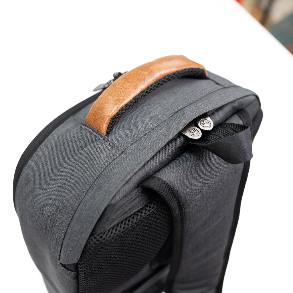 PKG Robson 12L Cross-Body Laptop Bag top view showing storm flap that protects zipper seams from rain
