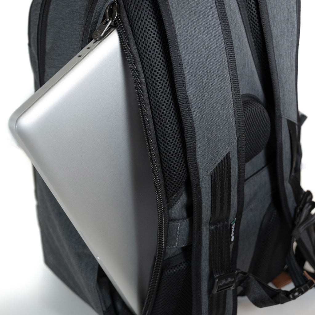 PKG Aurora recycled backpack (grey) showing dedicated laptop compartment in the back
