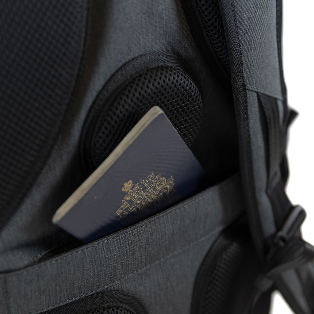 PKG Aurora recycled backpack (grey) showing hidden passport pocket on back