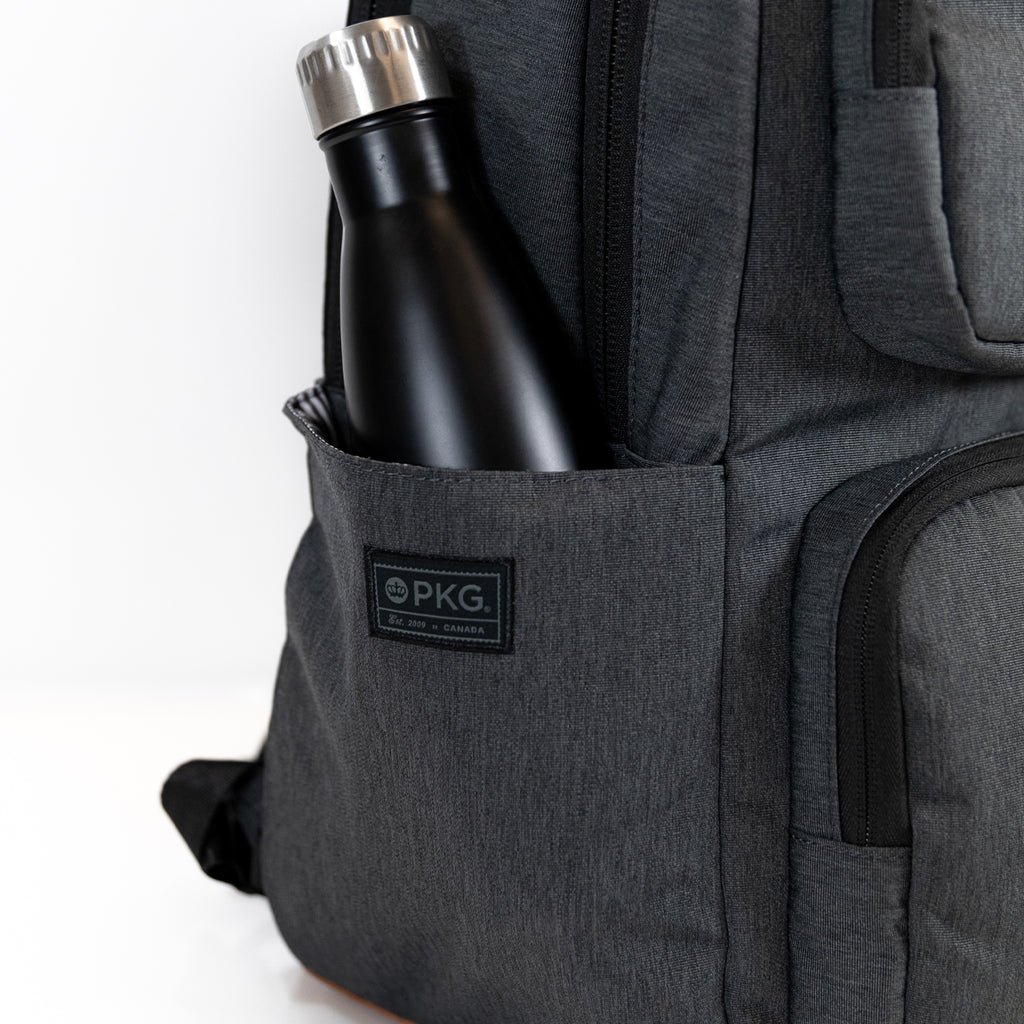 PKG Aurora recycled backpack (grey) showing water bottle pocket with water bottle