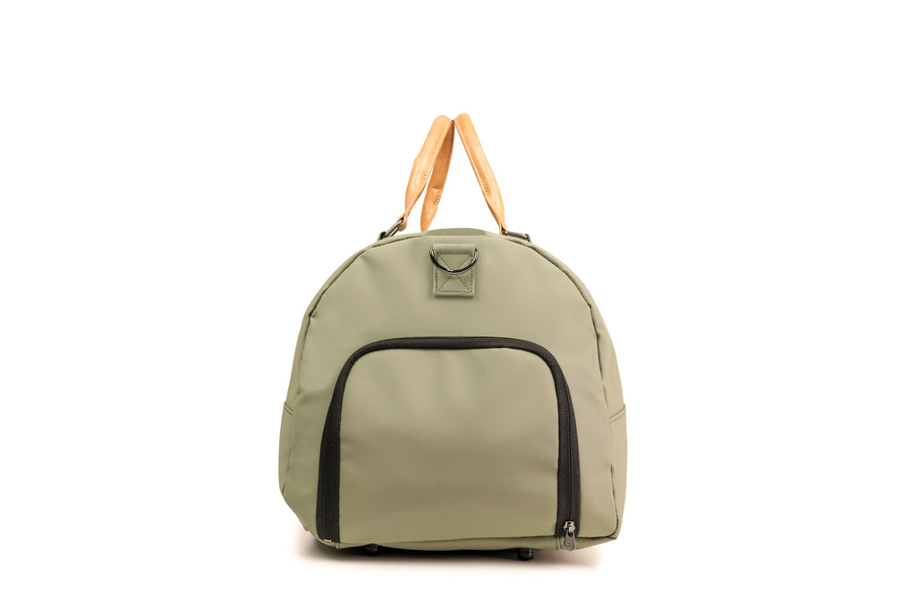 PKG Bishop 42L recycled duffle bag (tranquil green) side view showing laundry/shoe compartment