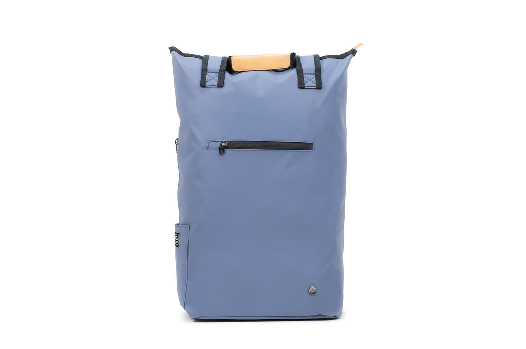 Liberty 23L recycled backpack (vintage blue) front view showing additional easy access storage for valuables