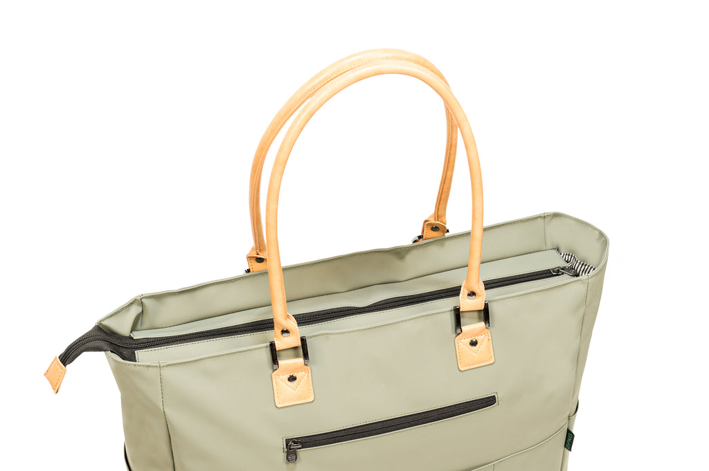 PKG Georgian 33L Recycled Tote Bag (tranquil green) top angled view showing reinforced faux leather handles and zipper to close