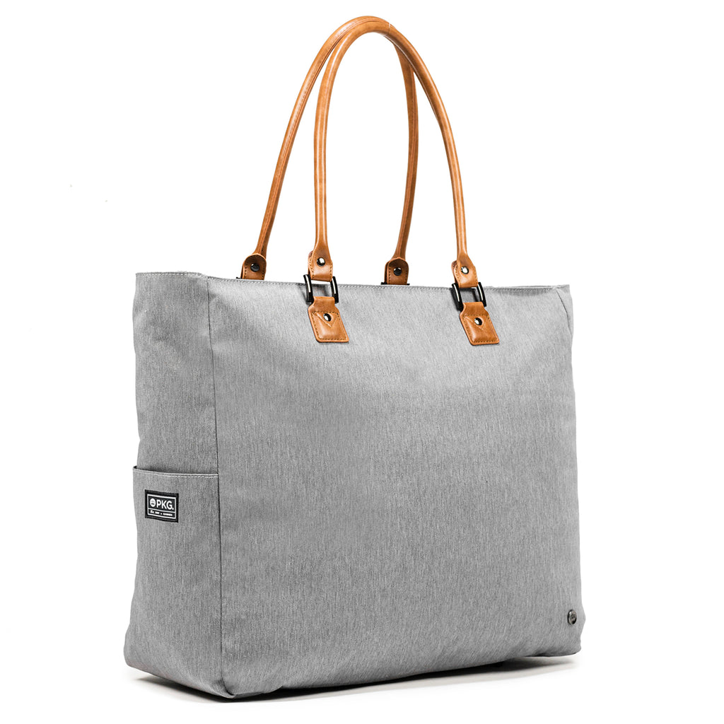 PKG Georgian 33L Recycled Tote Bag (light grey). Weather-resistant, padded base, metal feet, and faux leather accents, this tote ensures safety, durability, and style. Ideal for overnight trips, work, and more