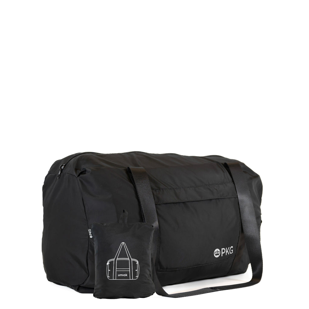 PKG umiak 31L Recycled Duffel (black), your eco-friendly everyday travel companion. Built with 100% recycled, water-resistant, and tear-resistant material. Antimicrobial, odor-resistant, and exceptionally durable with reinforced seams