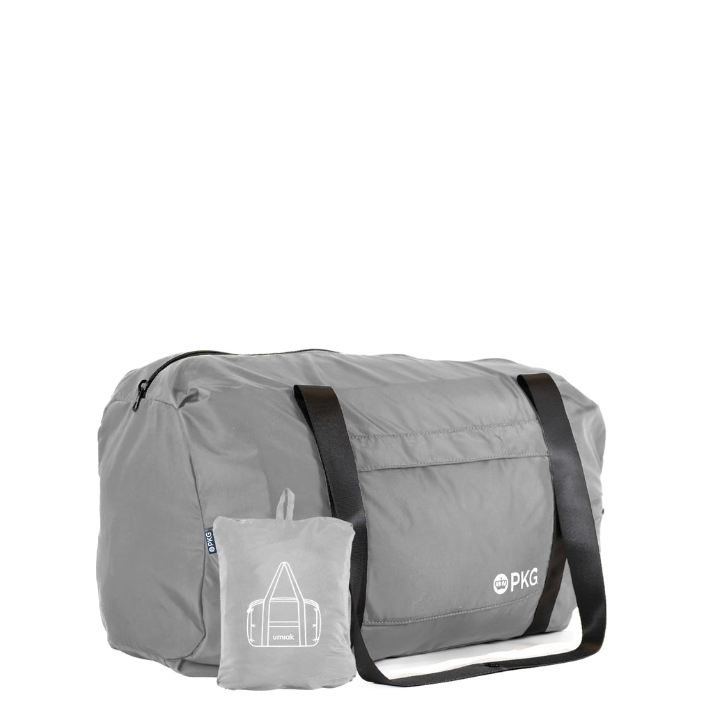 PKG umiak 31L Recycled Duffel (light grey), your eco-friendly everyday travel companion. Built with 100% recycled, water-resistant, and tear-resistant material. Antimicrobial, odor-resistant, and exceptionally durable with reinforced seams