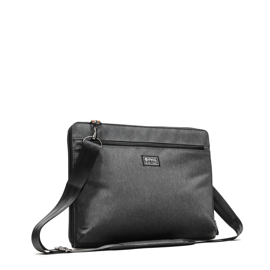 PKG Wellington 10L Messenger (dark grey) Compact and functional, keeps your laptop, paperwork, and chargers organized. Ideal for men and women, the accordion design suits up to 14” laptops