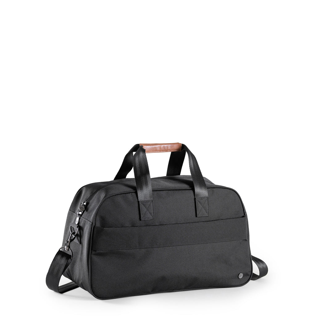 PKG Westmount 26L Recycled Duffle Bag (black) – a midsize daily carry crafted from weather-resistant, recycled 600D polyester. With lockable zippers, padded strap, and vegan leather accents, it's your ideal duffle for eco-friendly adventures