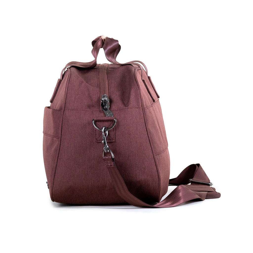 PKG Westmount 26L Recycled Duffle Bag (rum raisin) side view showing d-ring connected to detachable shoulder strap