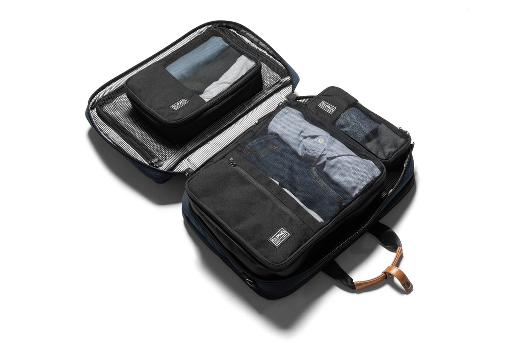 PKG Union Recycled Packing Cubes (3-pack) (navy) showing cubes being packed into each other