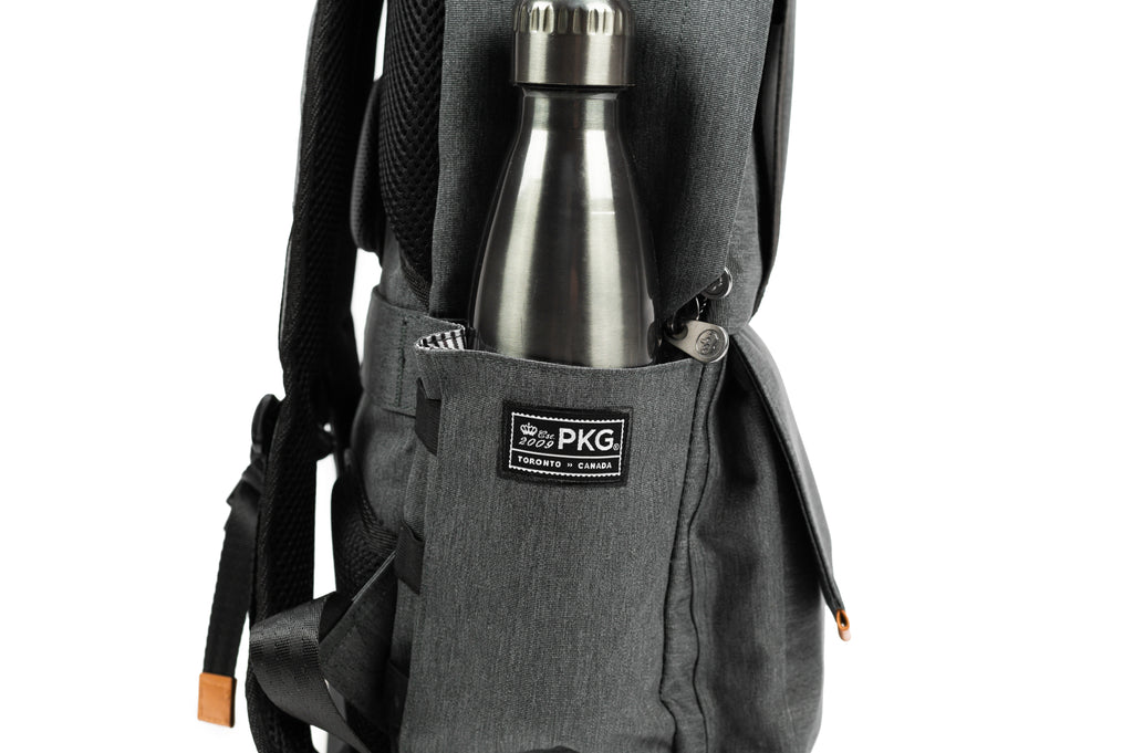 PKG Rosseau 19L Recycled Backpack Tote (grey) side view showing water bottle in water bottle pocket